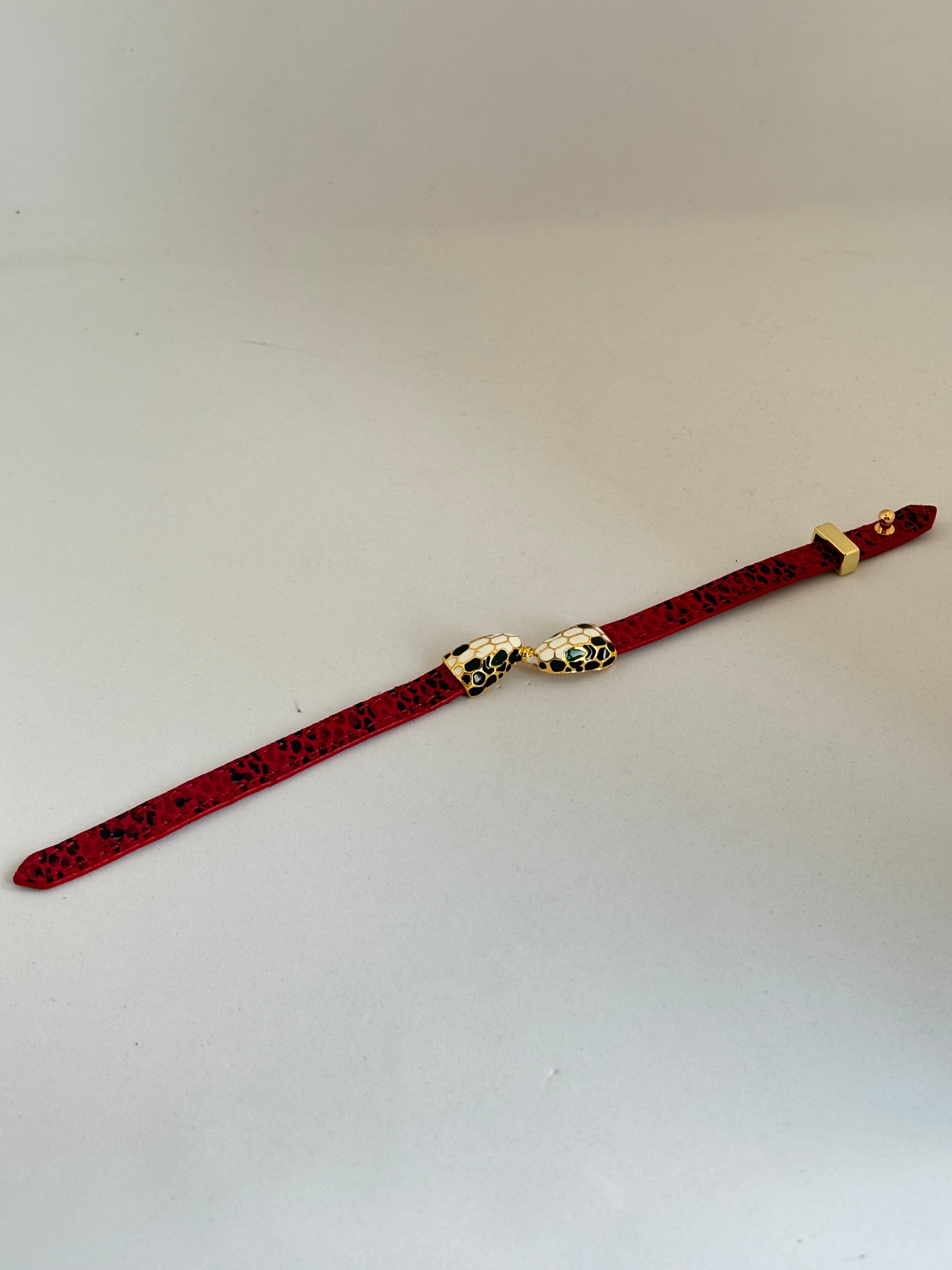 red textured snake charm bracelet