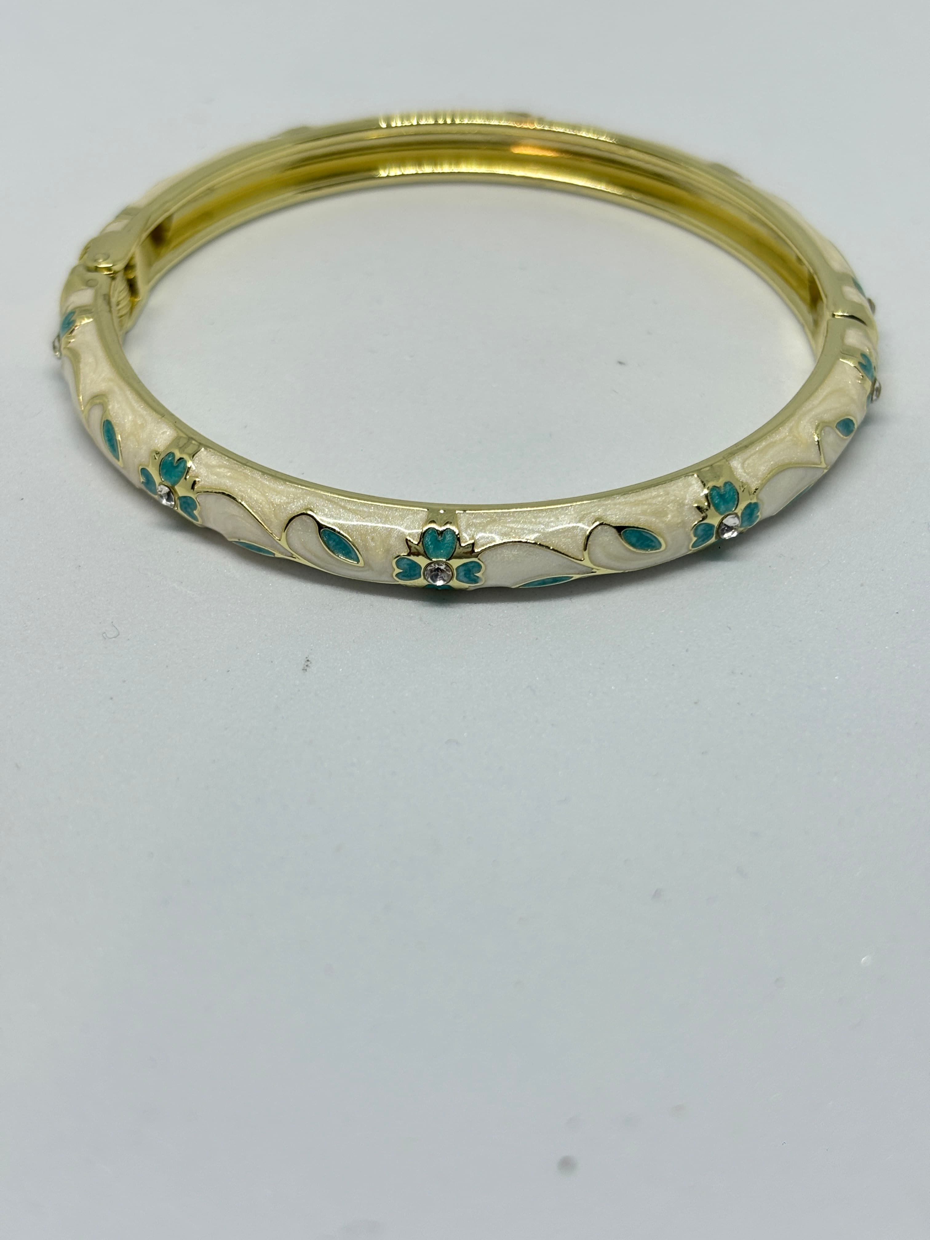 enamel floral hinged gold bangle