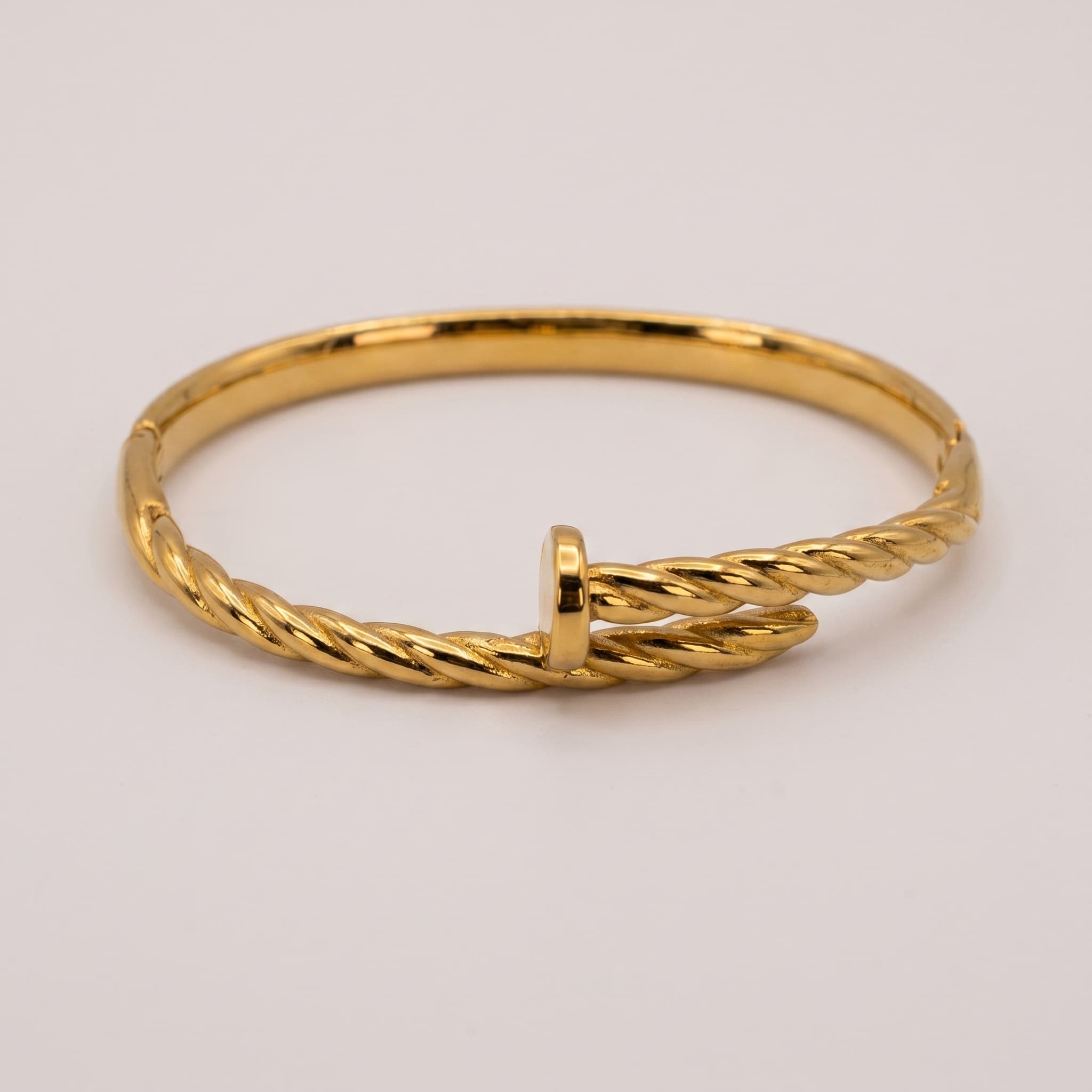 twisted gold nail bracelet