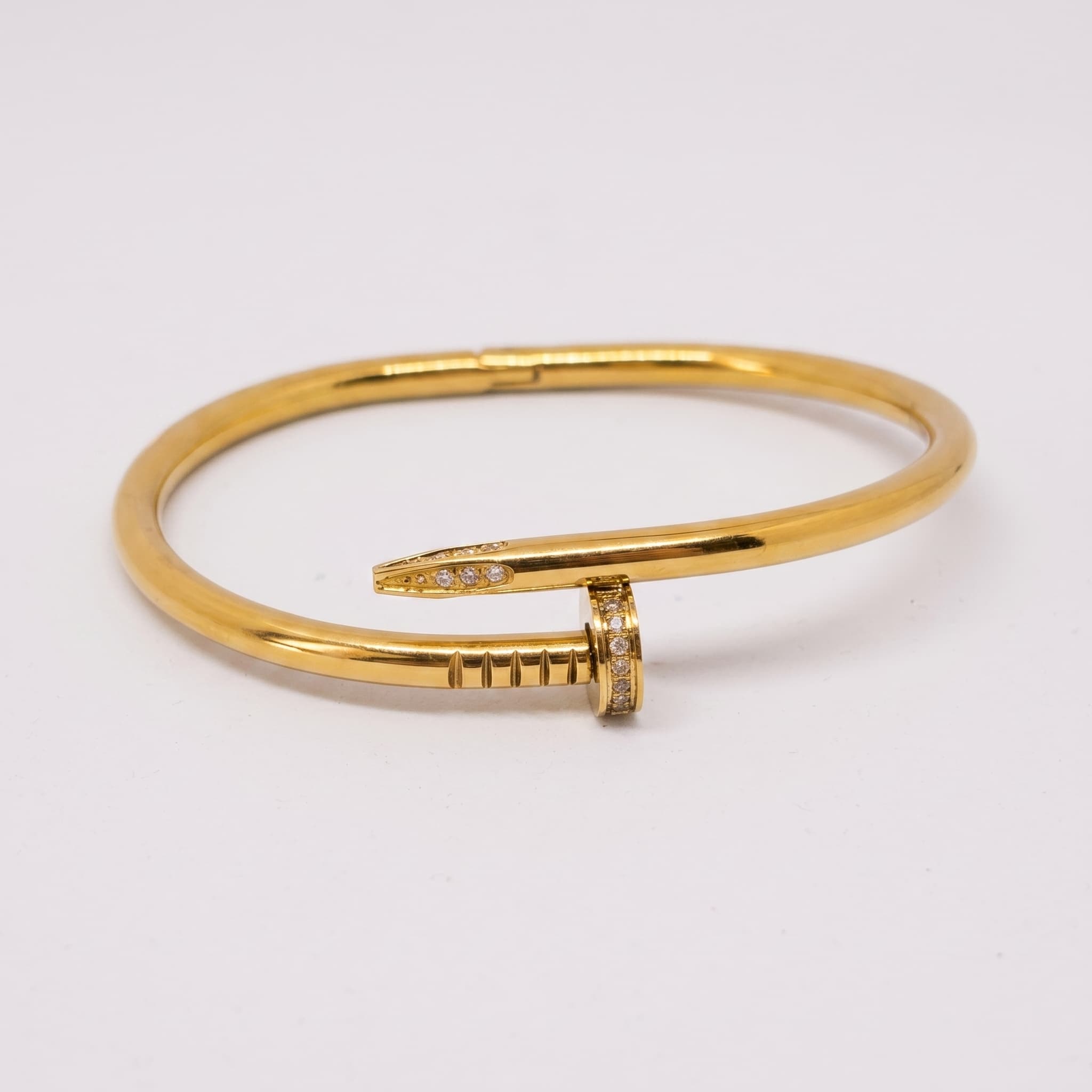 golden nail detail bangle