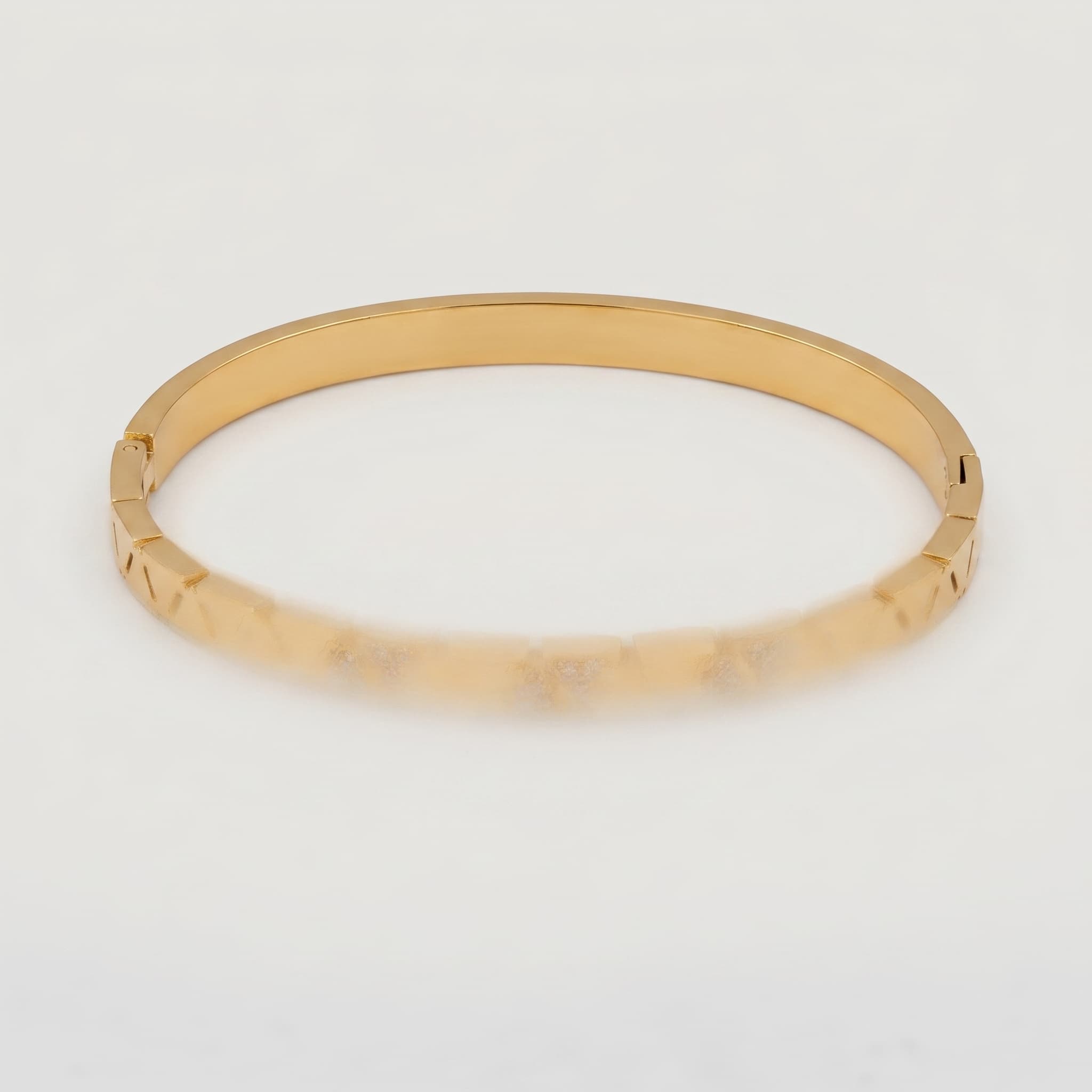 golden geometric hinged cuff