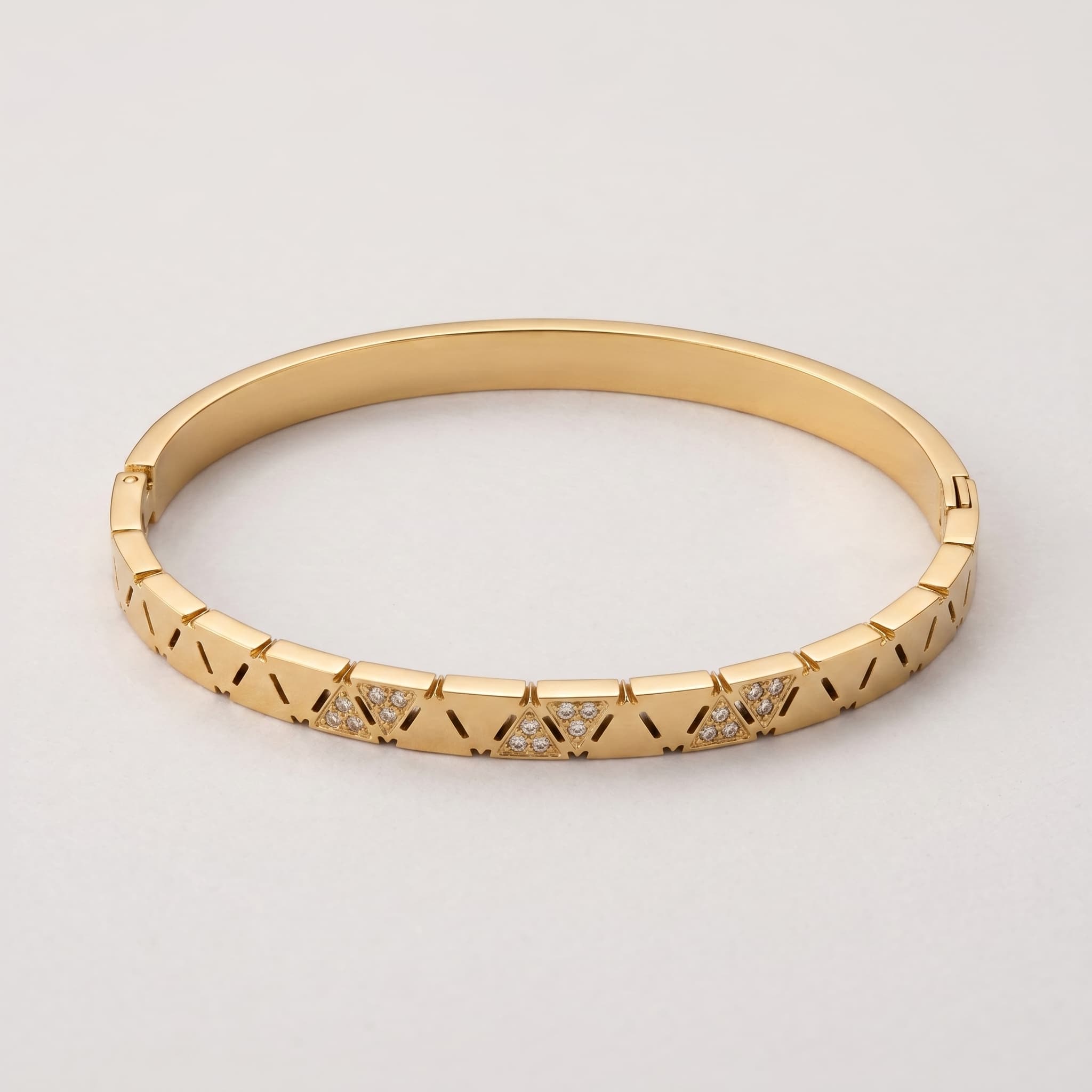 golden geometric hinged cuff