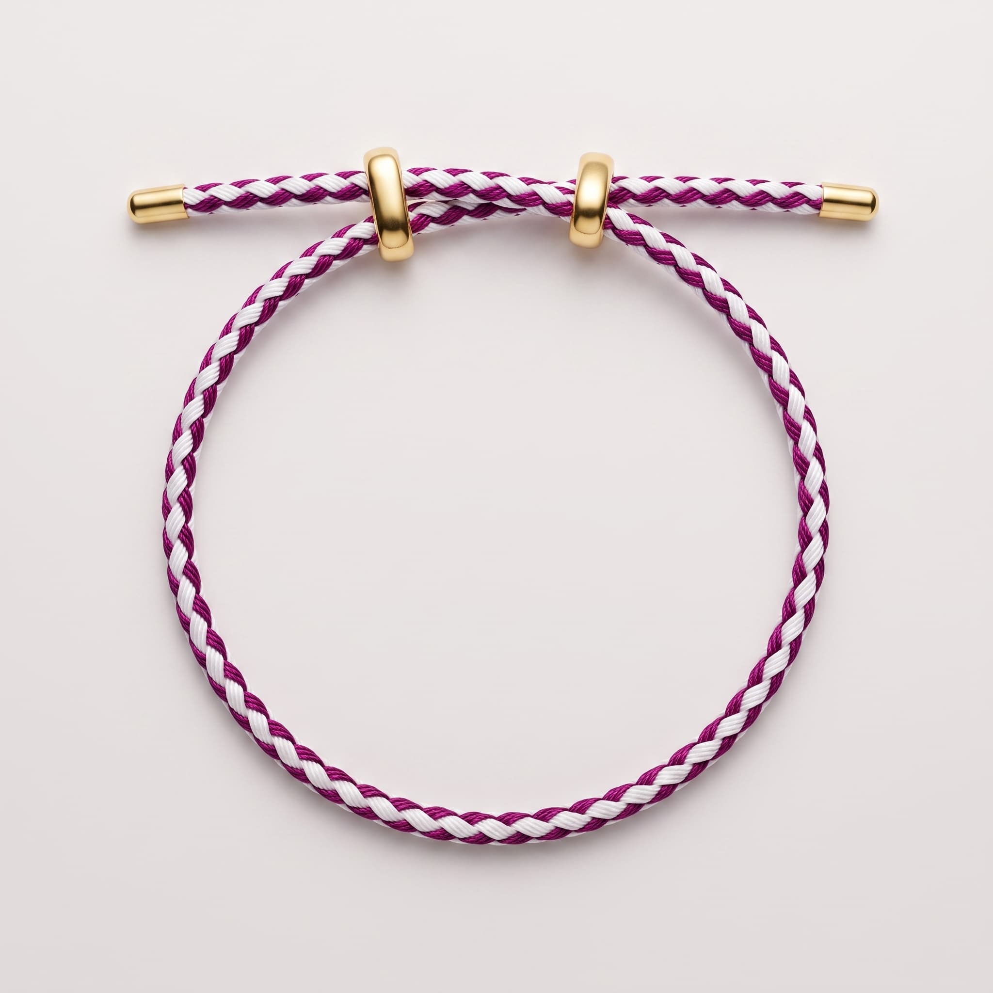 purple and white braided bracelet