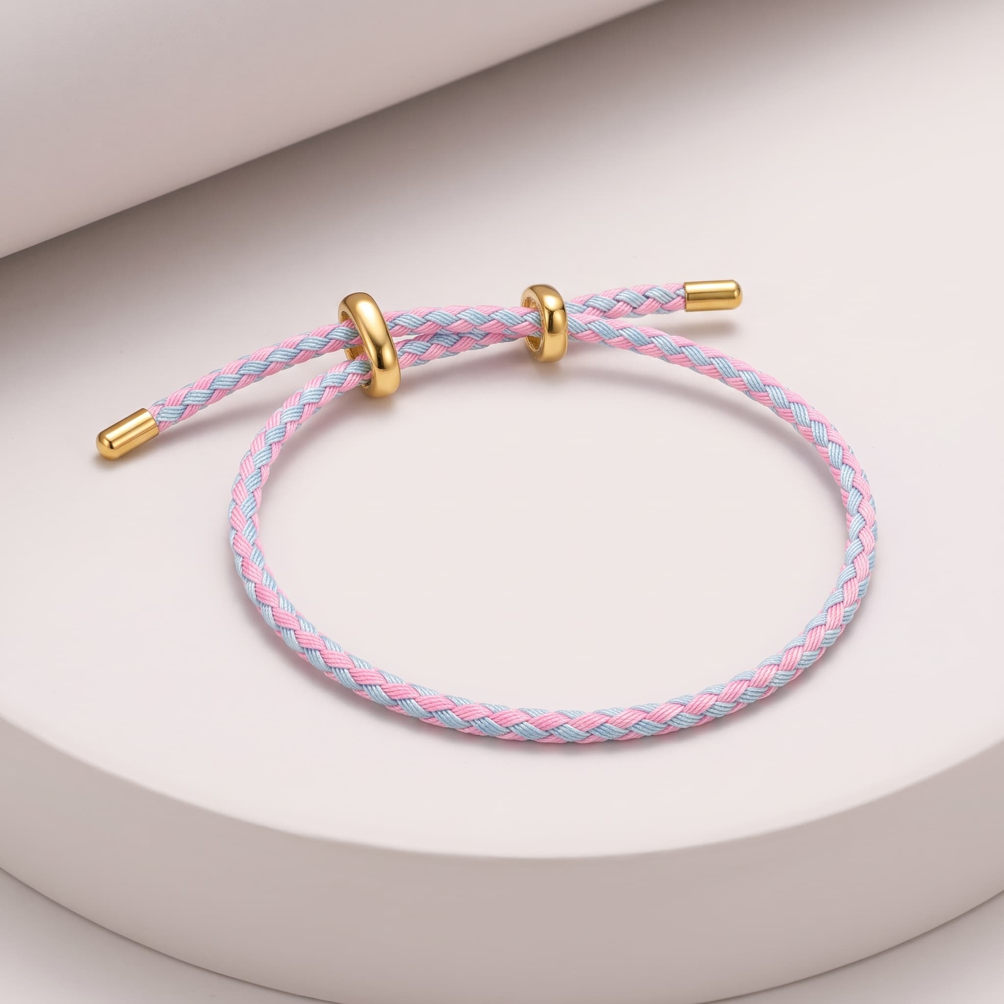 pink and blue braided bracelet