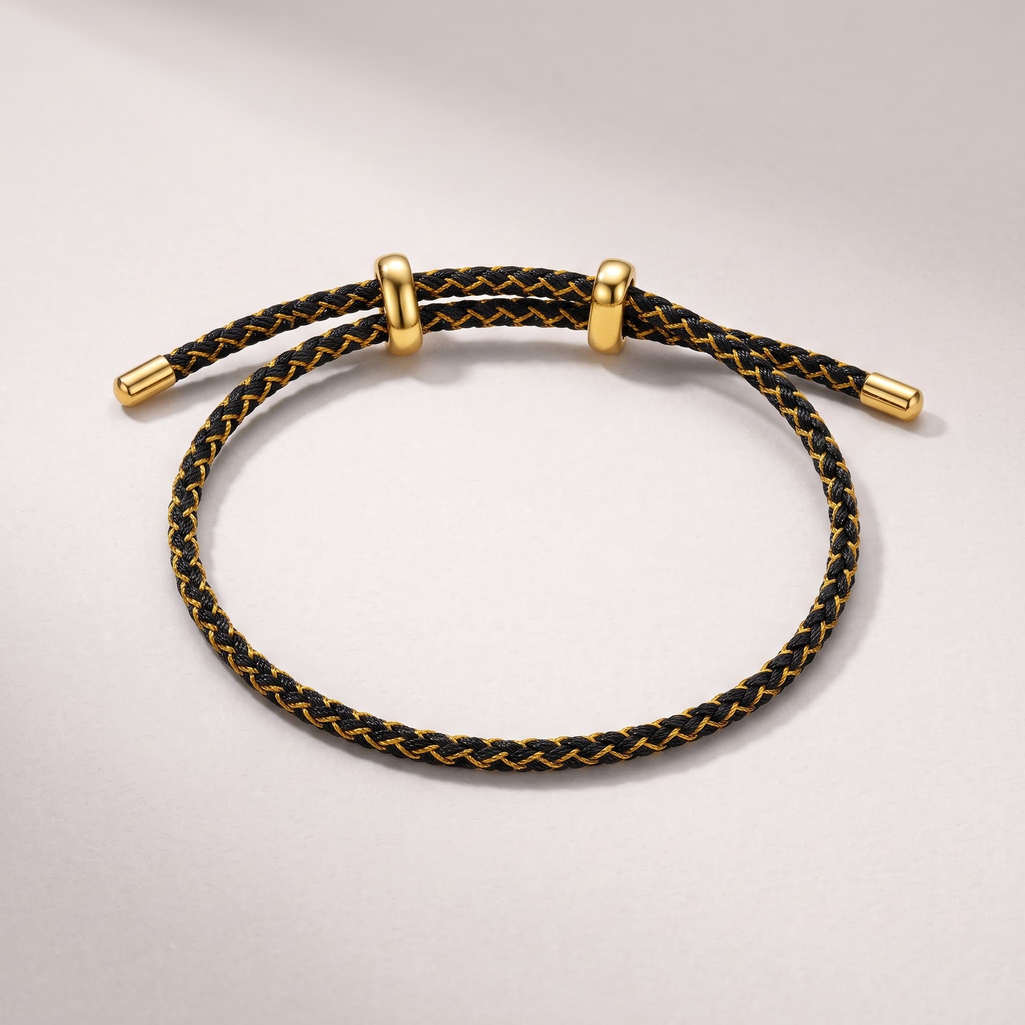 black and gold woven bracelet