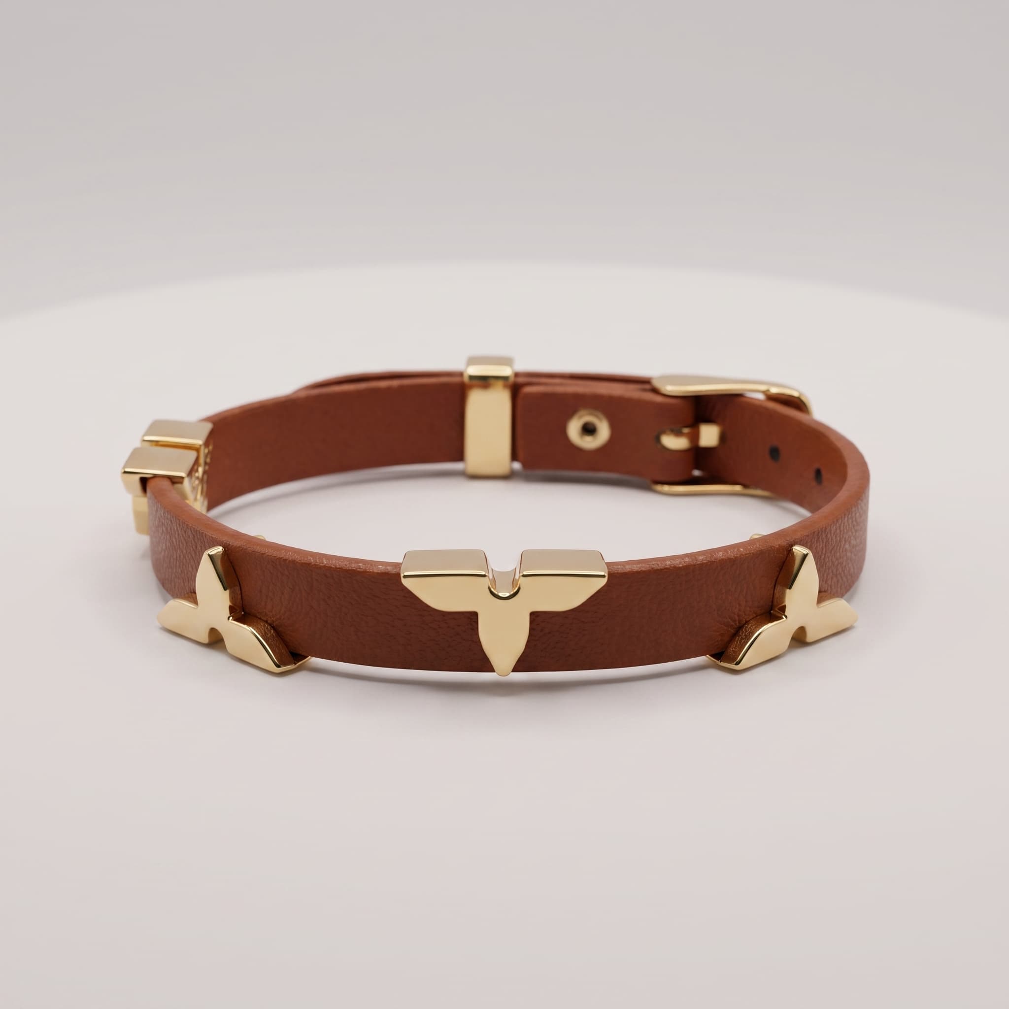 brown leather gold detail bracelet
