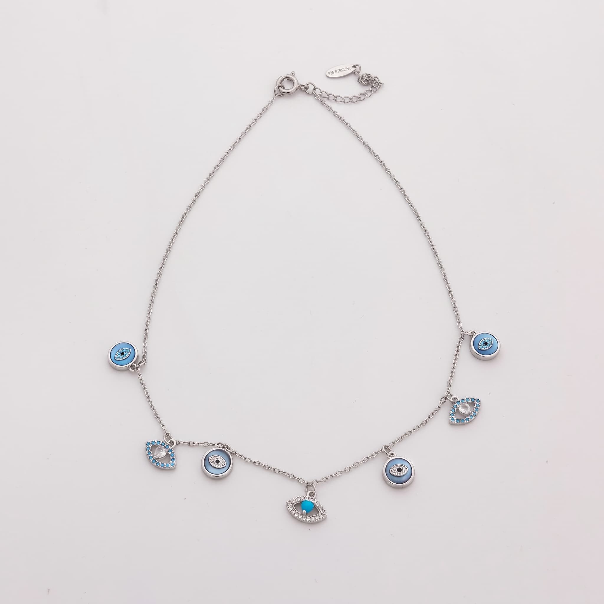 silver evil eye charm necklace