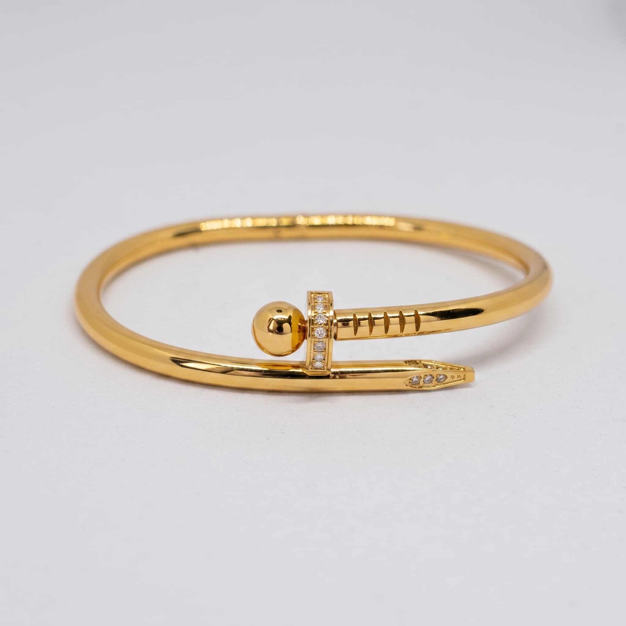 sleek gold nail cuff