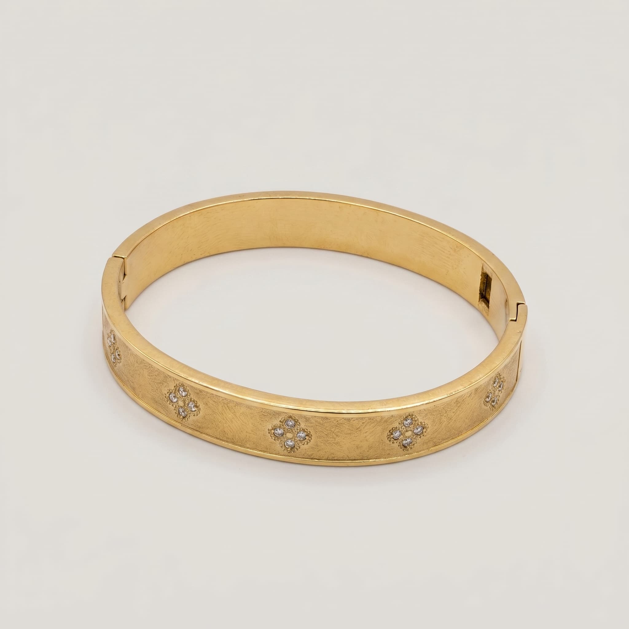dainty stone studded gold cuff