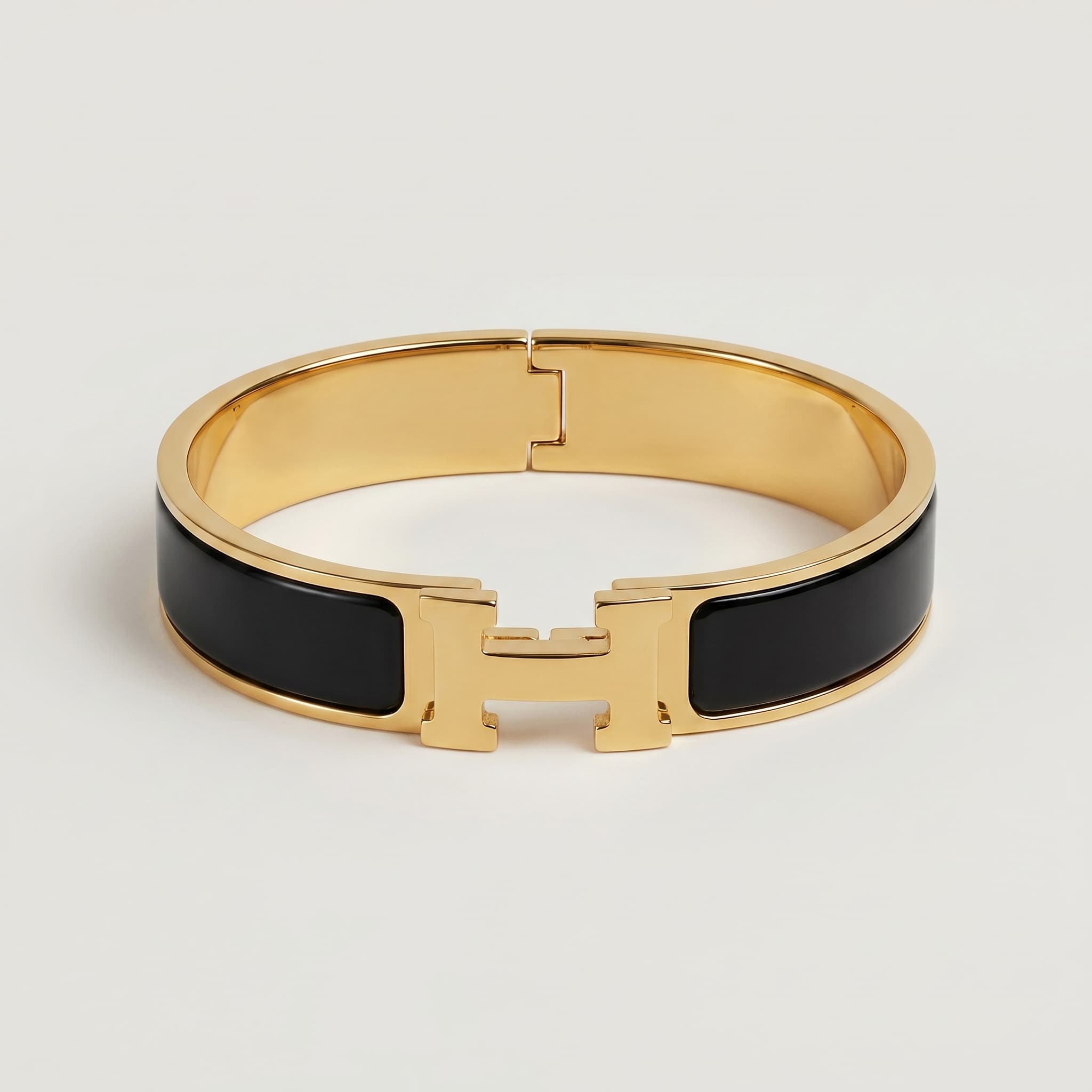 sleek black and gold cuff