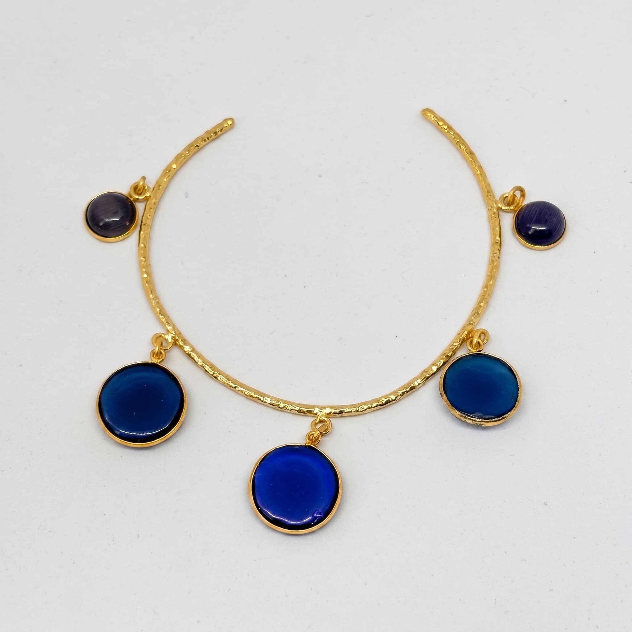 blue charm hammered gold bangle