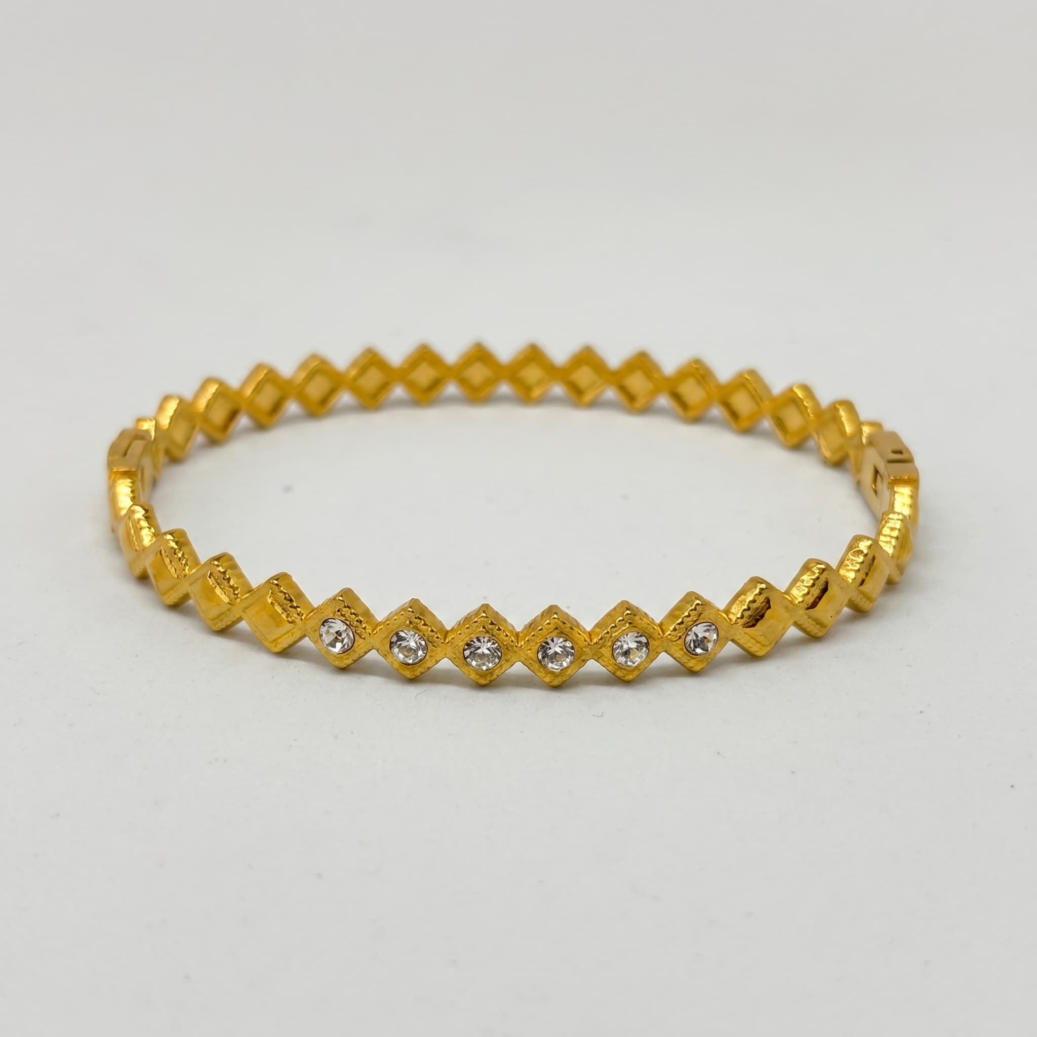 diamond cut gold bangle