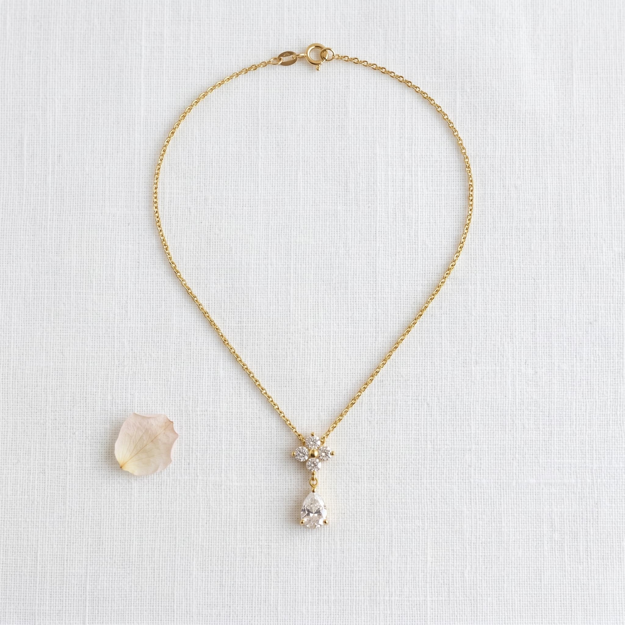 delicate gold floral teardrop necklace