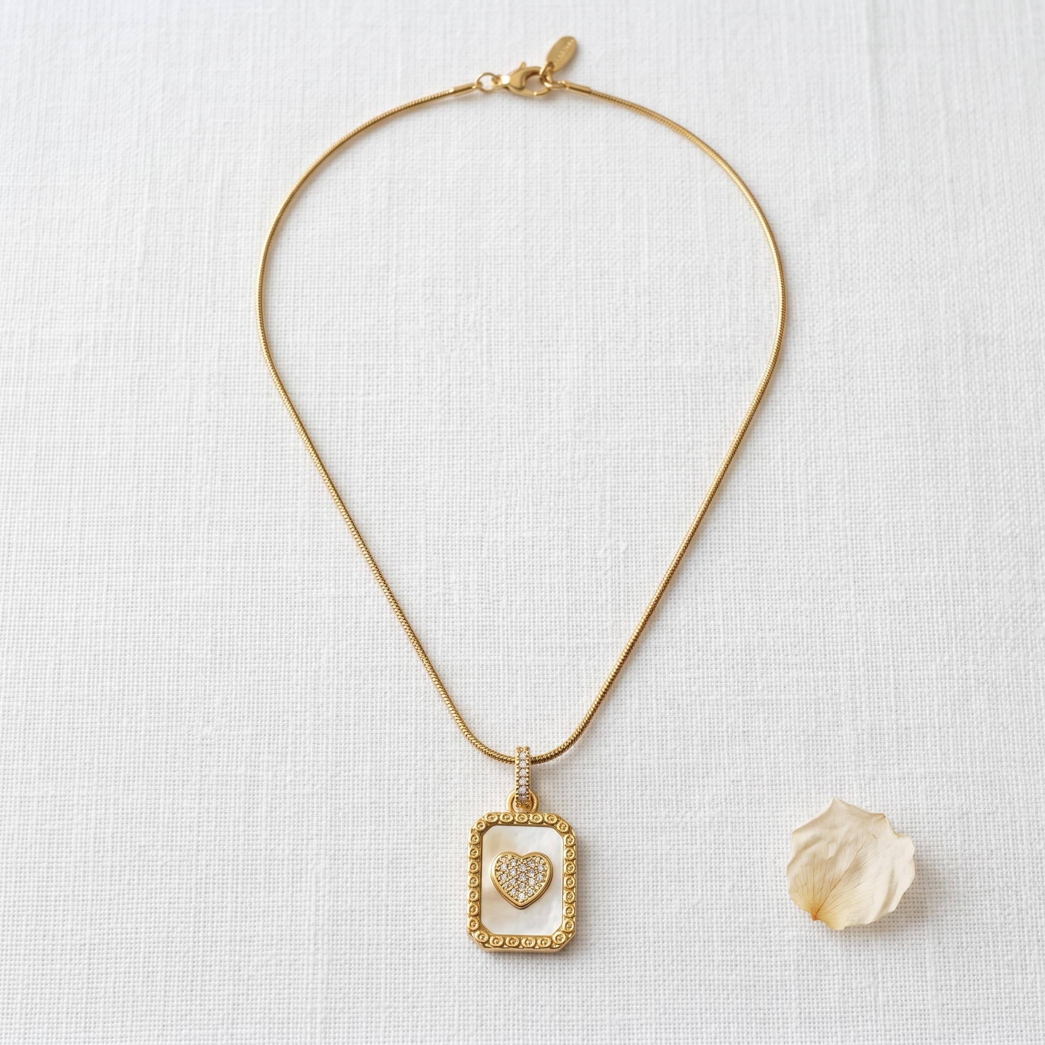 golden heart mother of pearl pendant