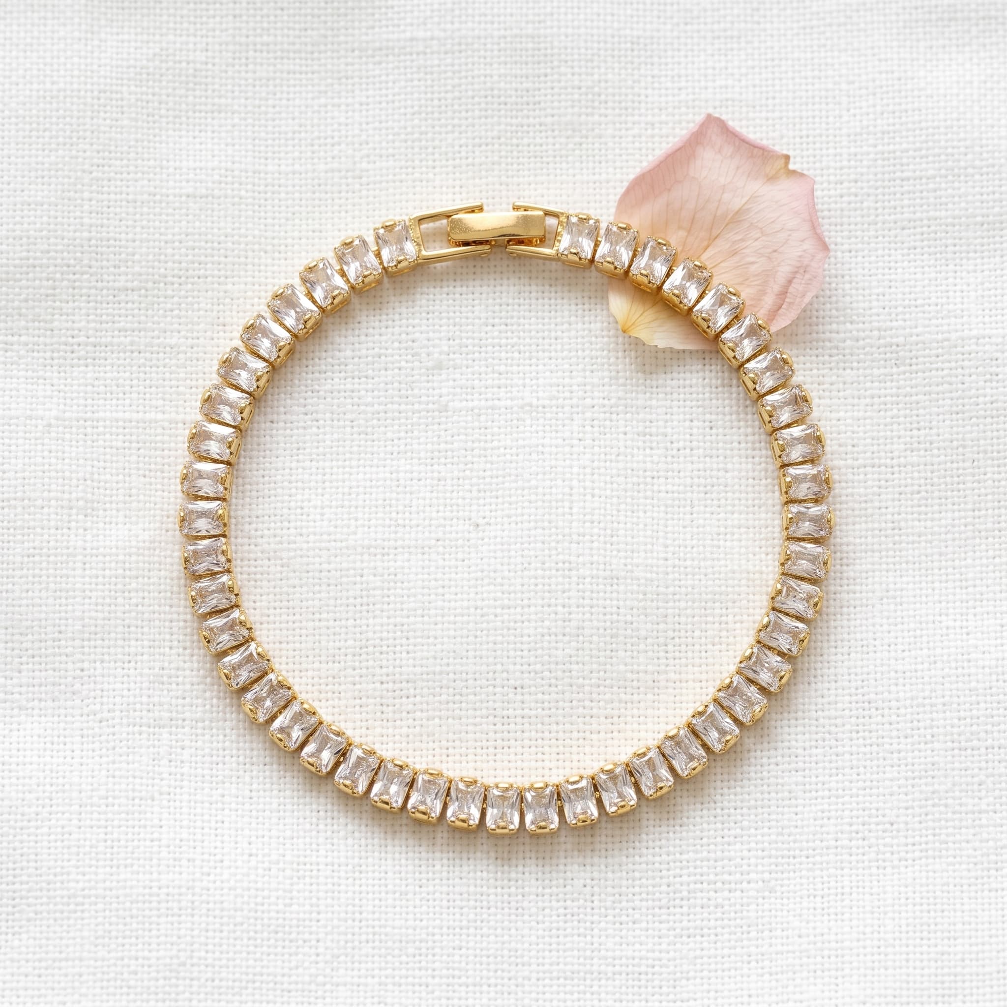 classic gold stone tennis bracelet