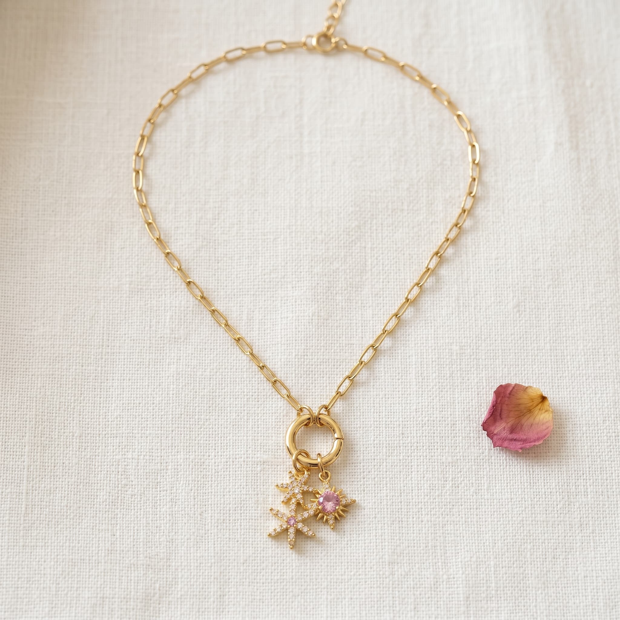 sunburst pink stone charm necklace