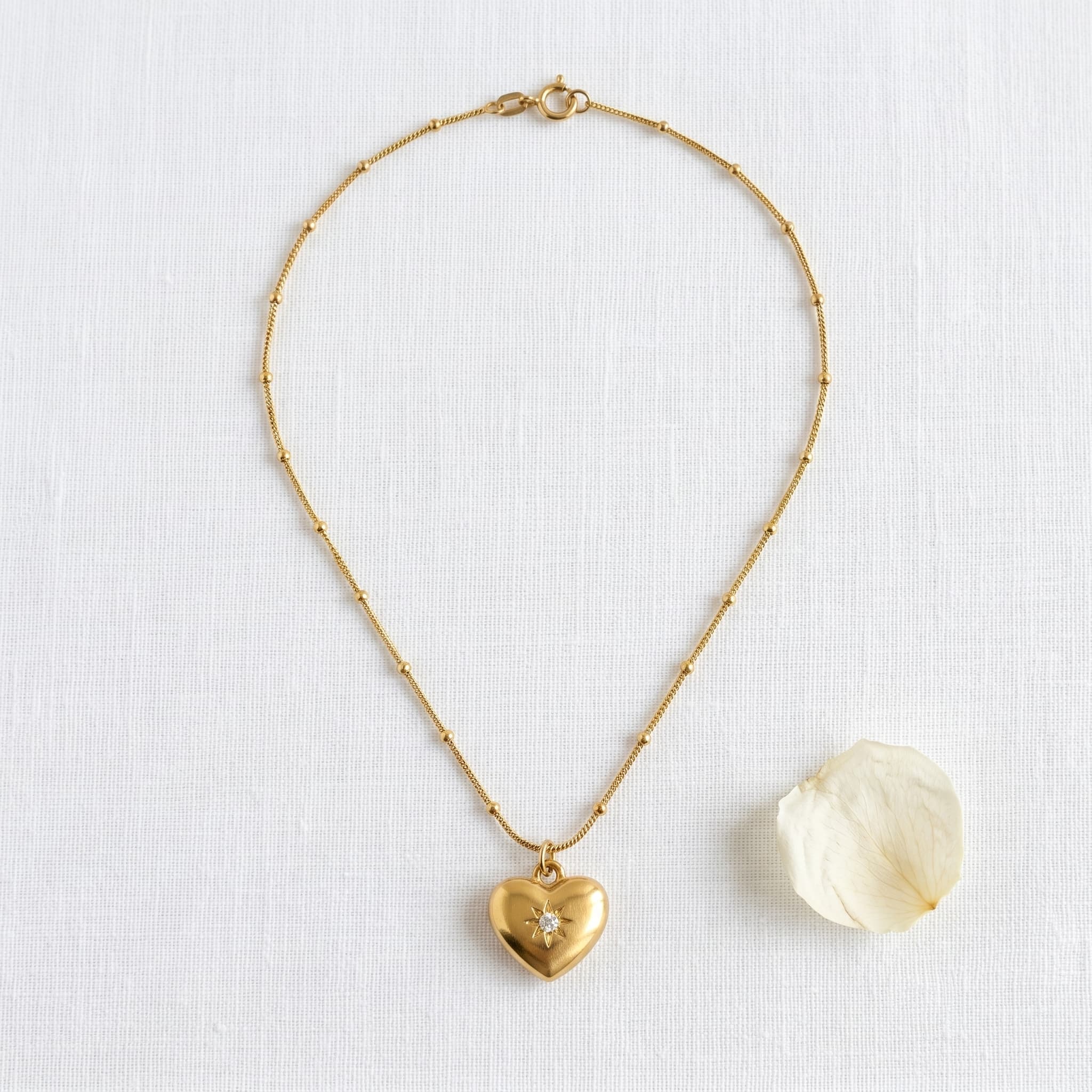 little golden heart pendant