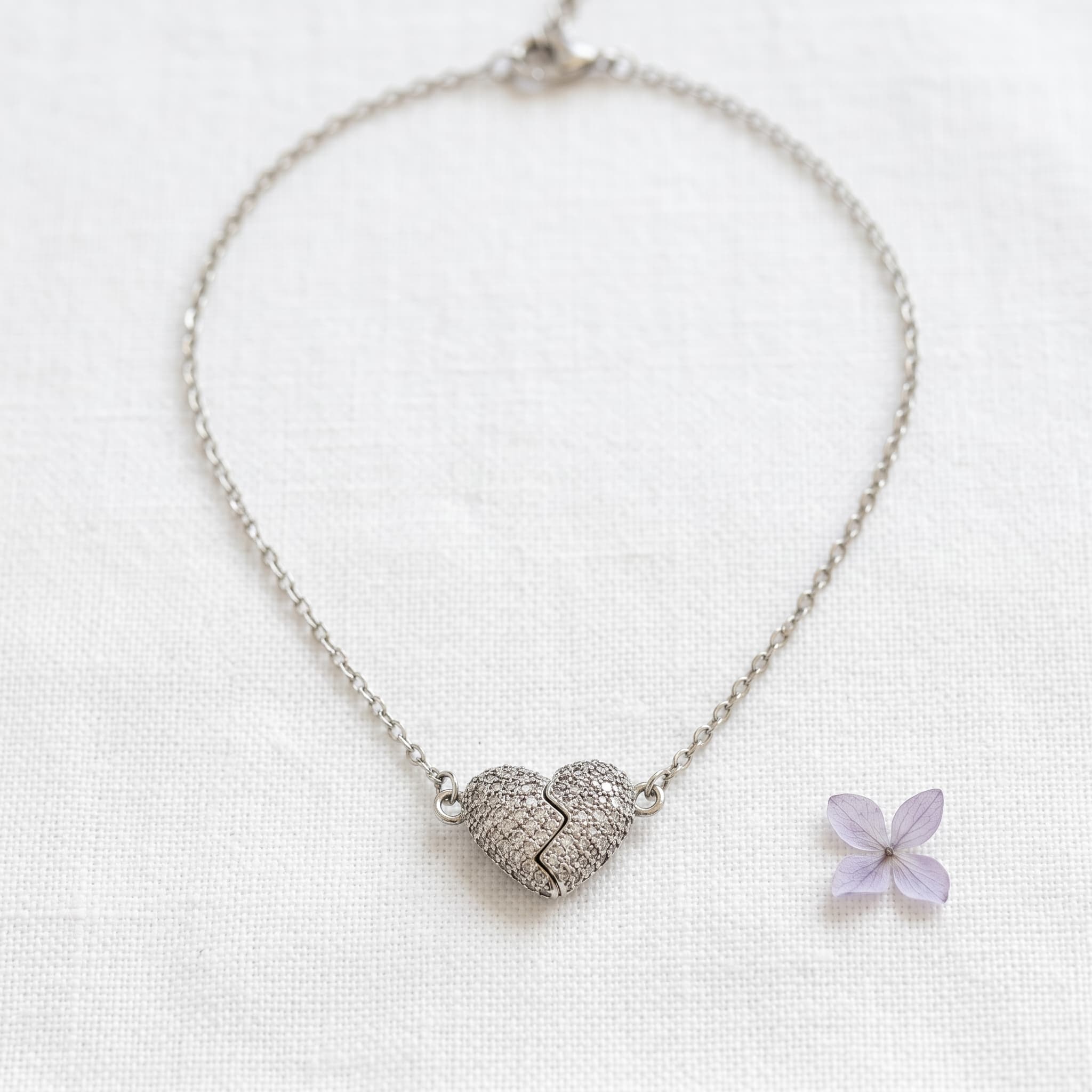 shimmering magnetic silver heart pendant