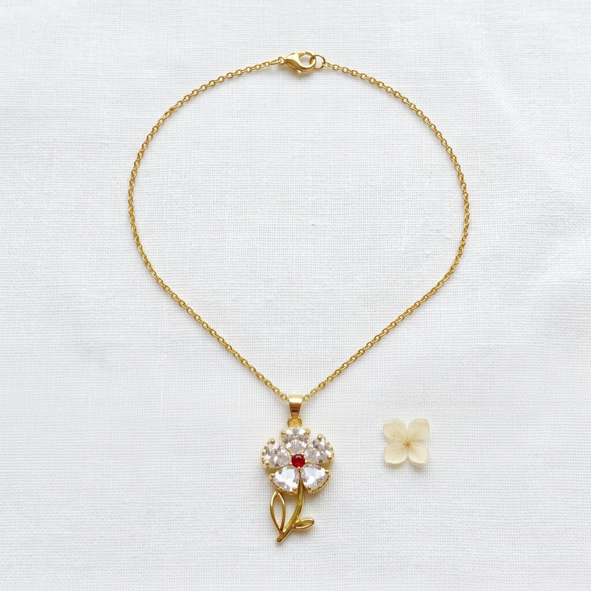 dainty crystal flower pendant