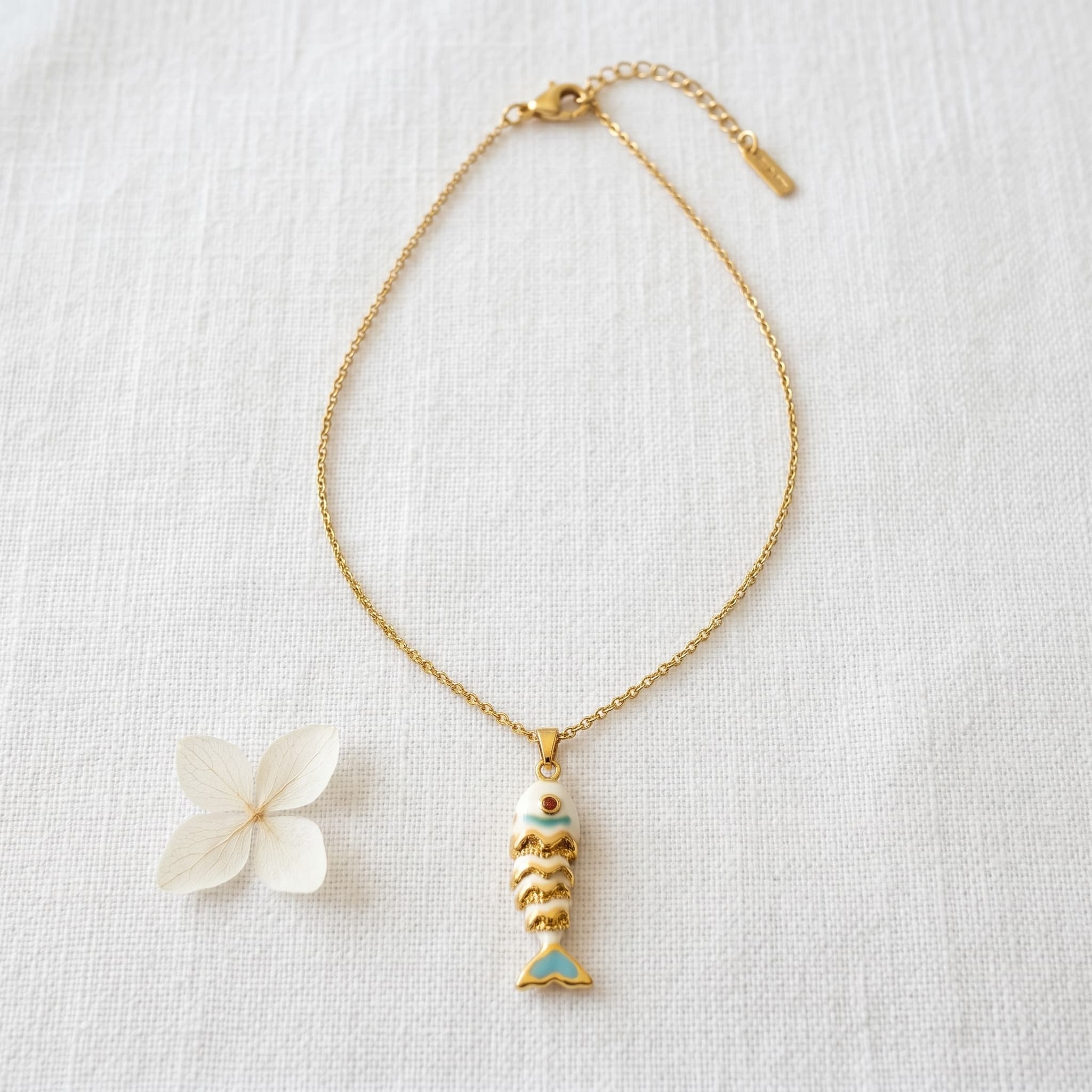 little golden fish pendant