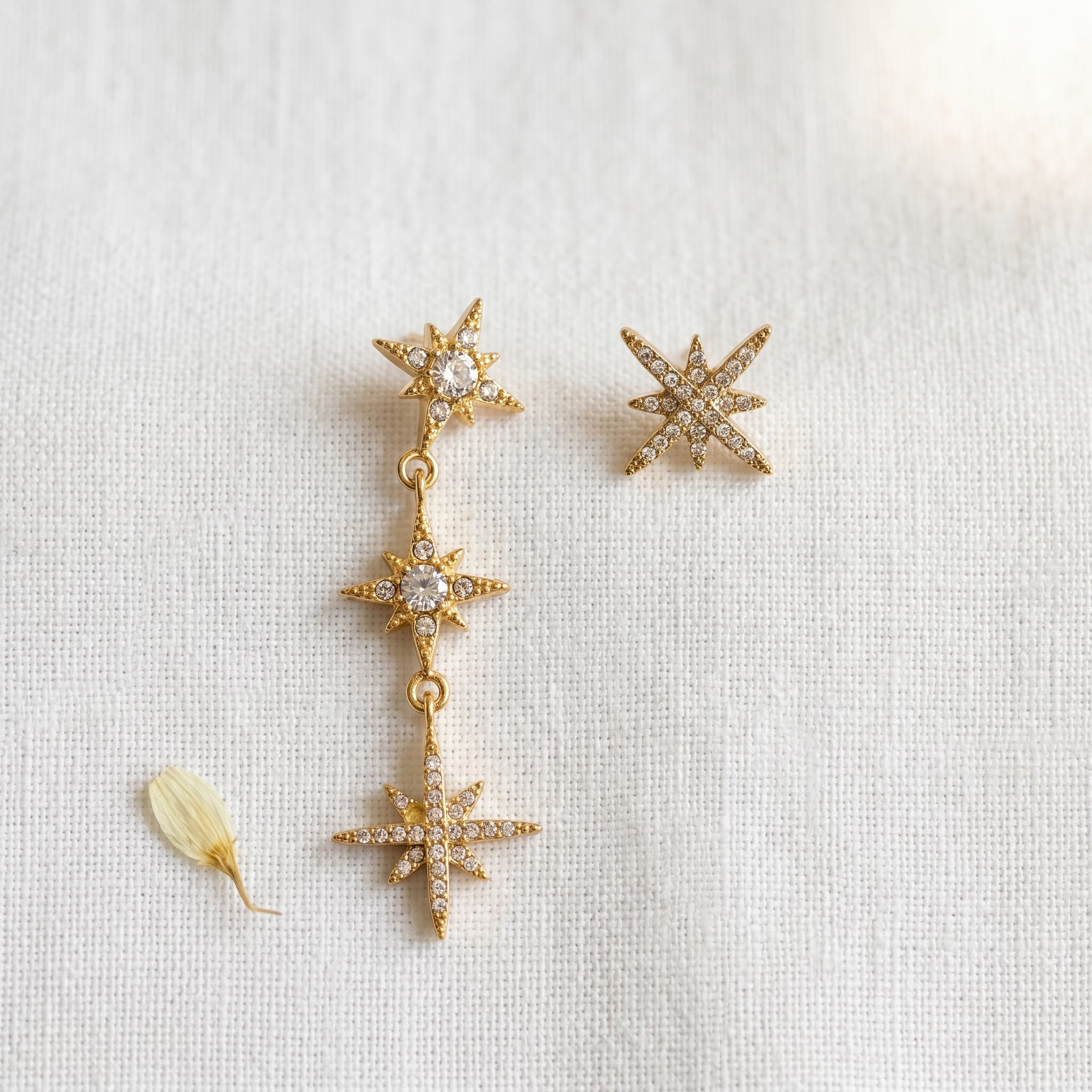 asymmetrical starburst stud and dangle