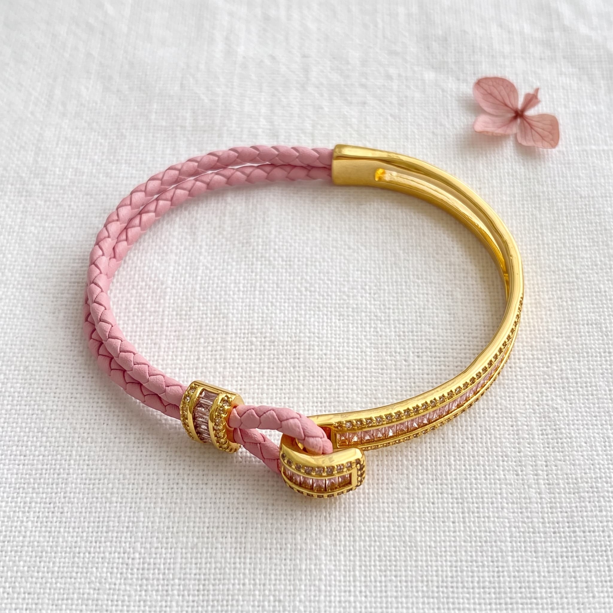 pink braided charm bracelet