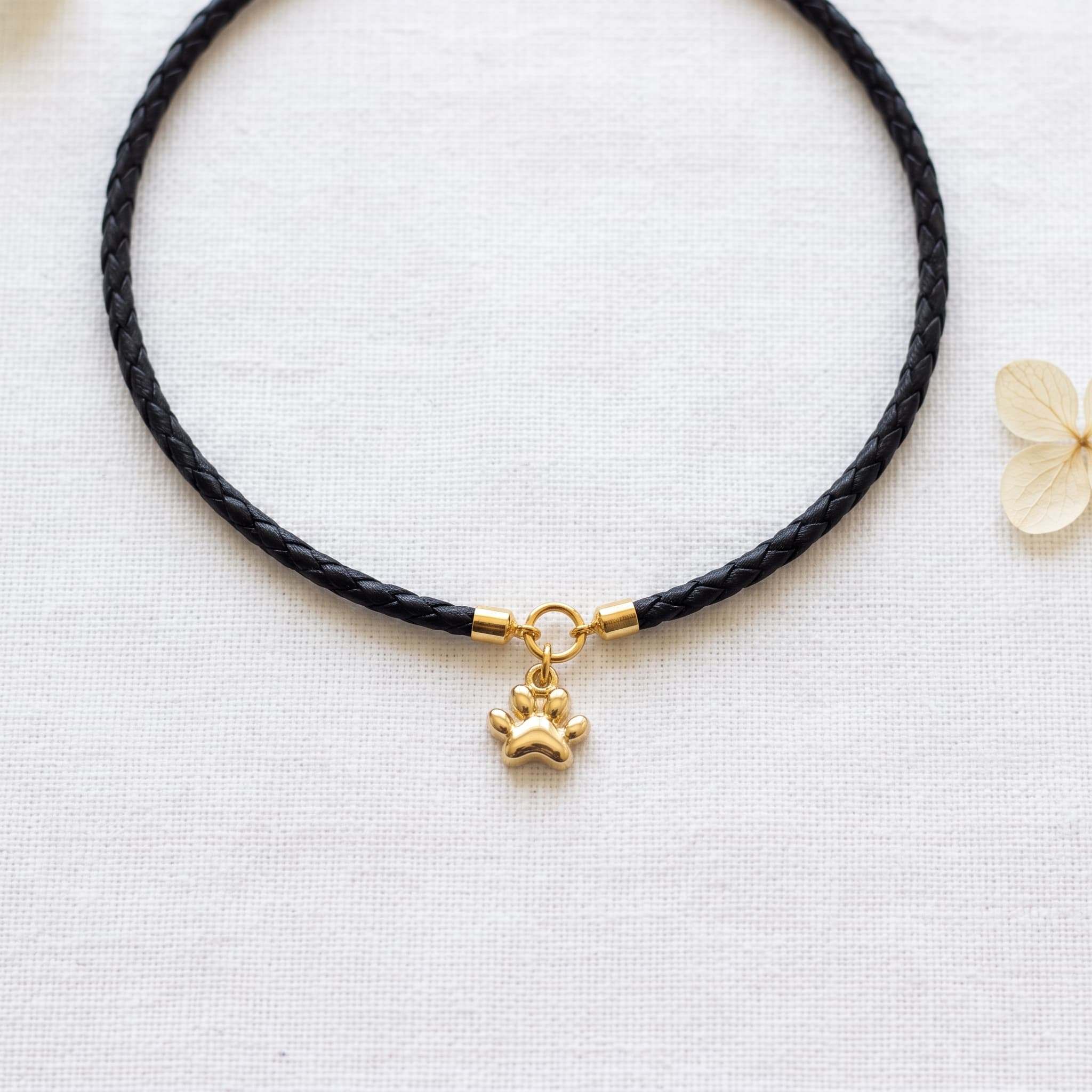 paw print black cord choker