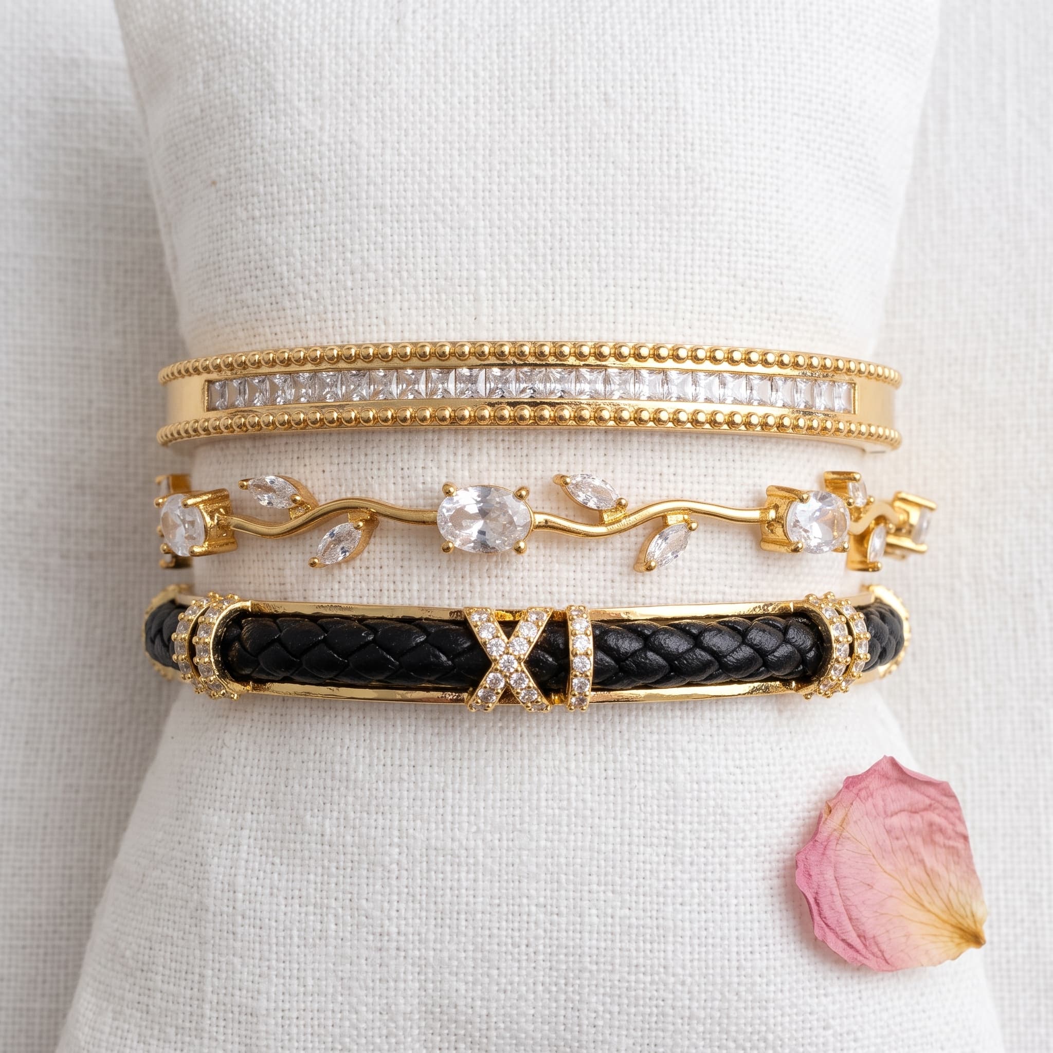 trio of gold tone cuffs
