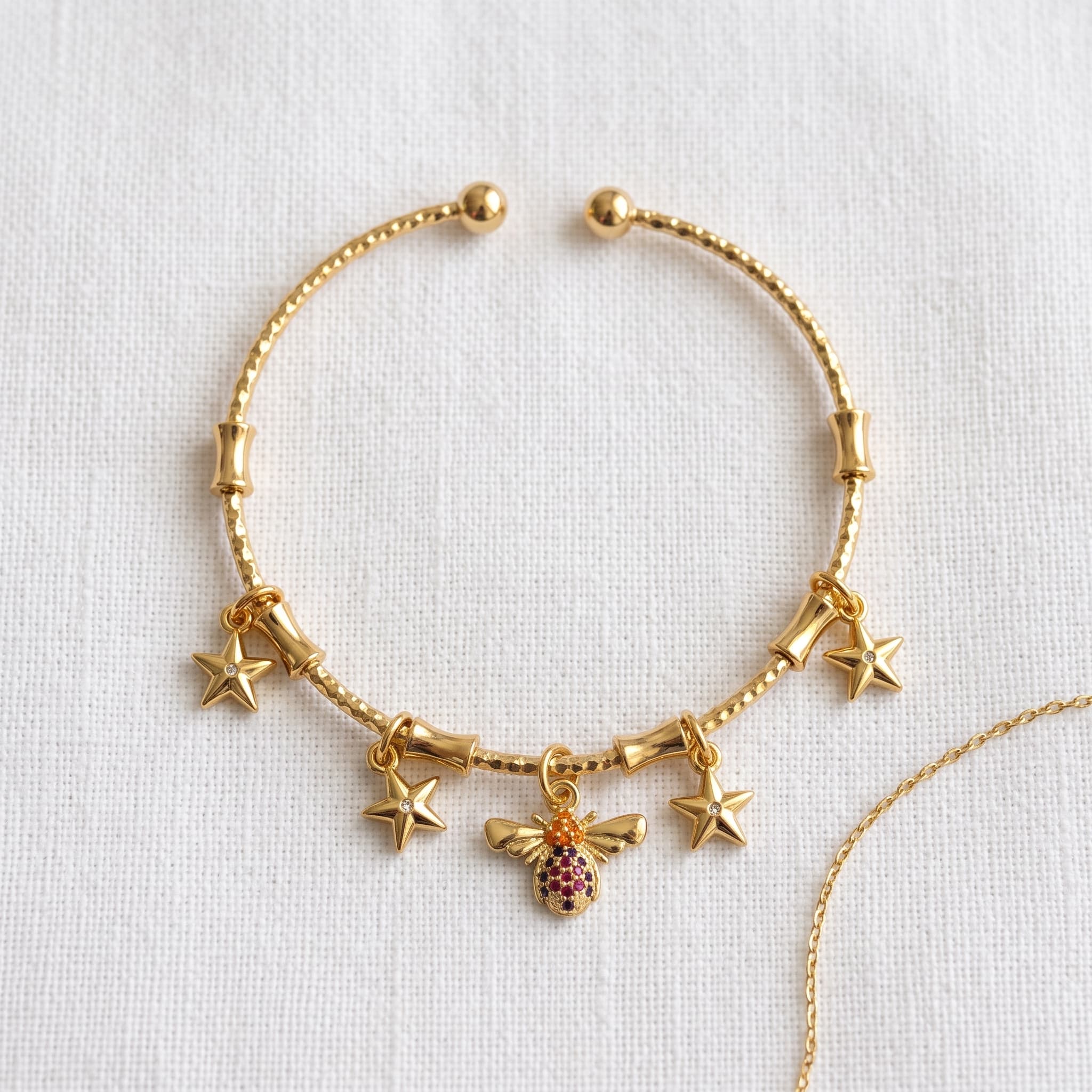 golden bee and star cuff
