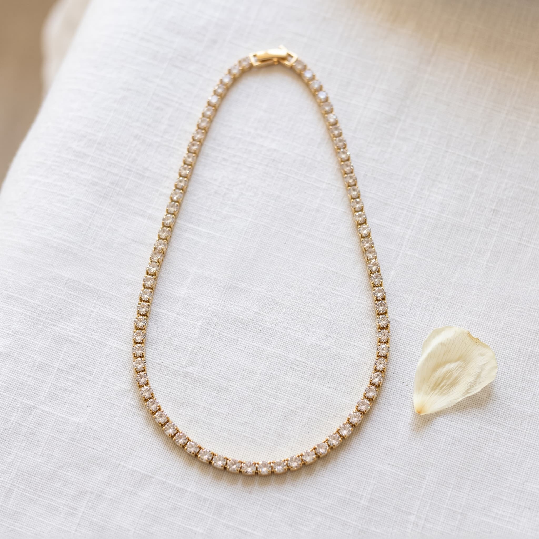 Aditi gold stone tennis necklace