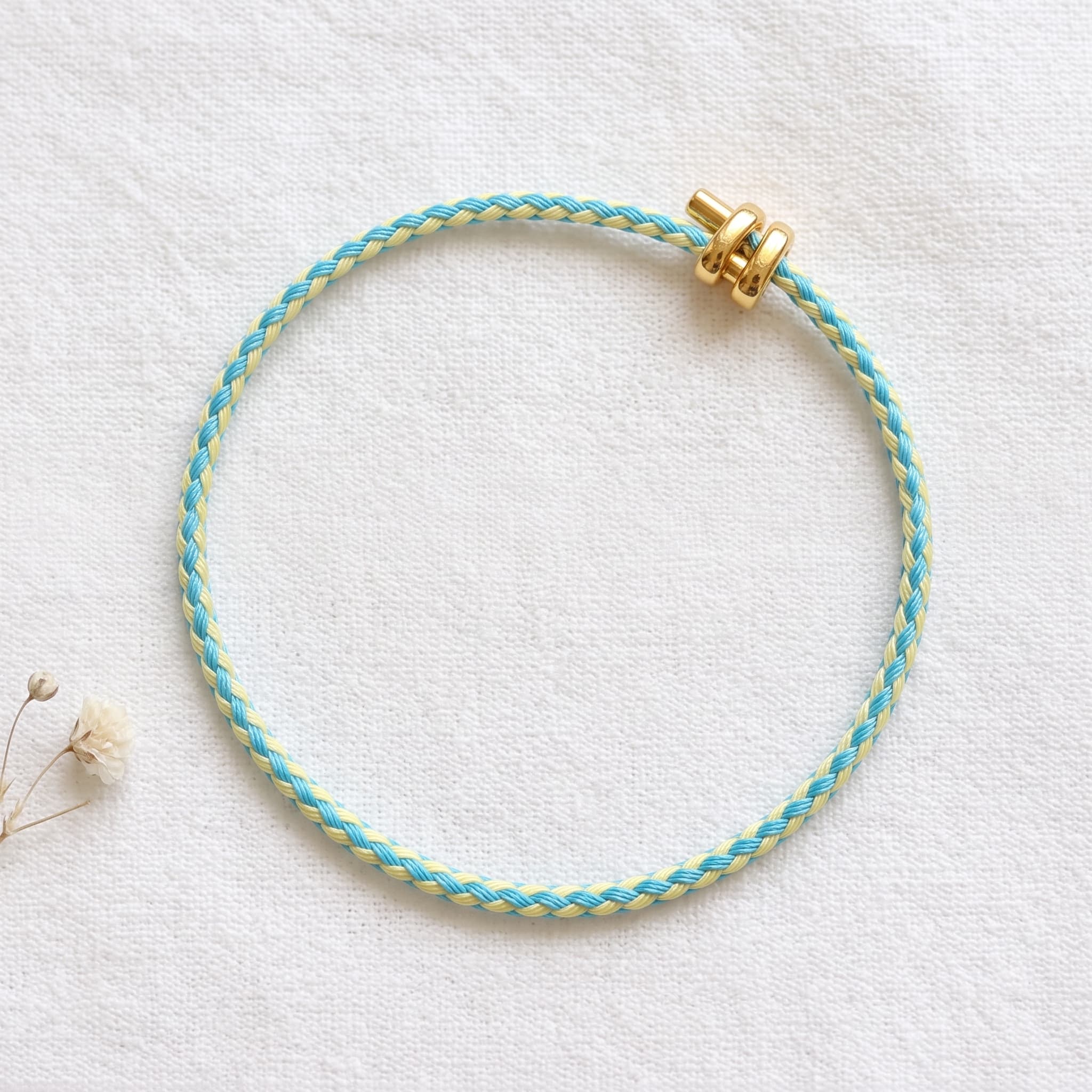 blue and yellow woven bracelet