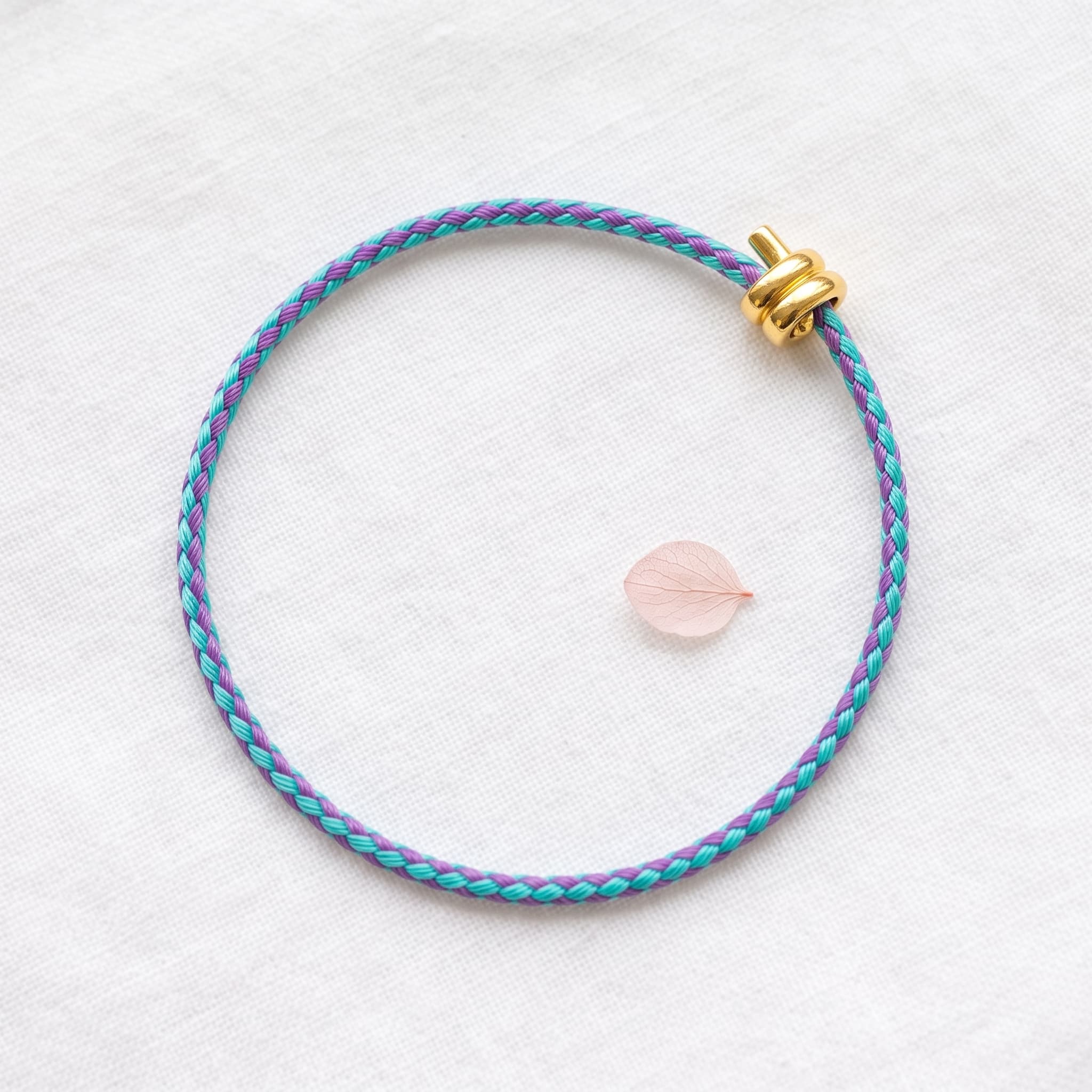 teal and purple braided bracelet