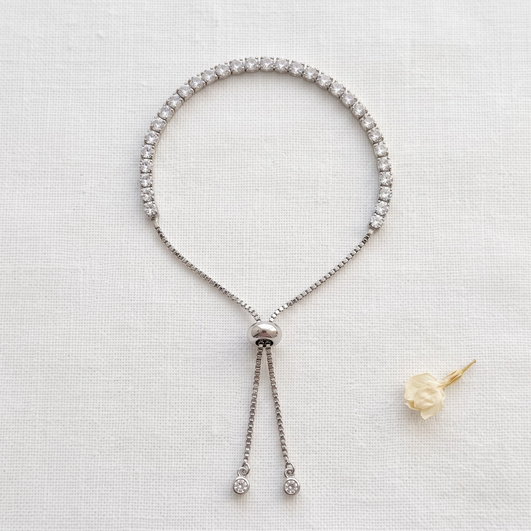 dainty silver stone tennis bracelet