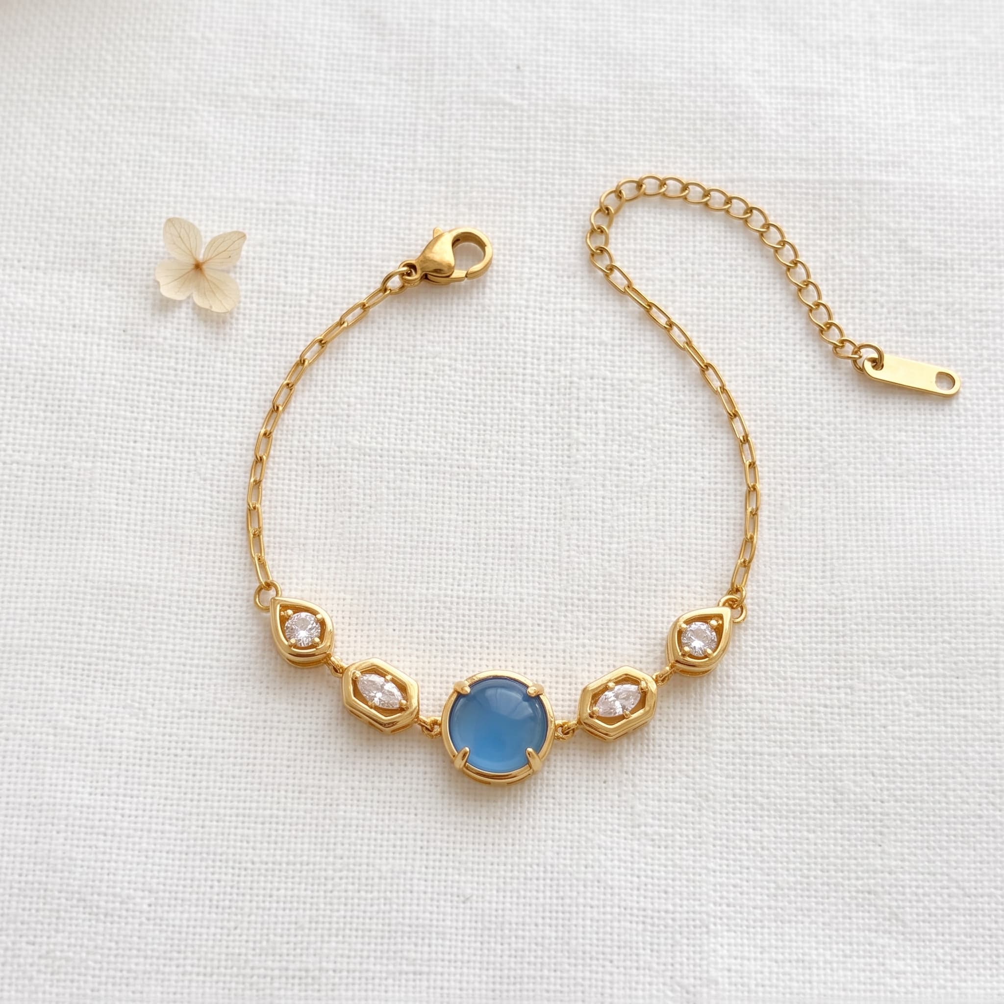 blue stone gold link bracelet