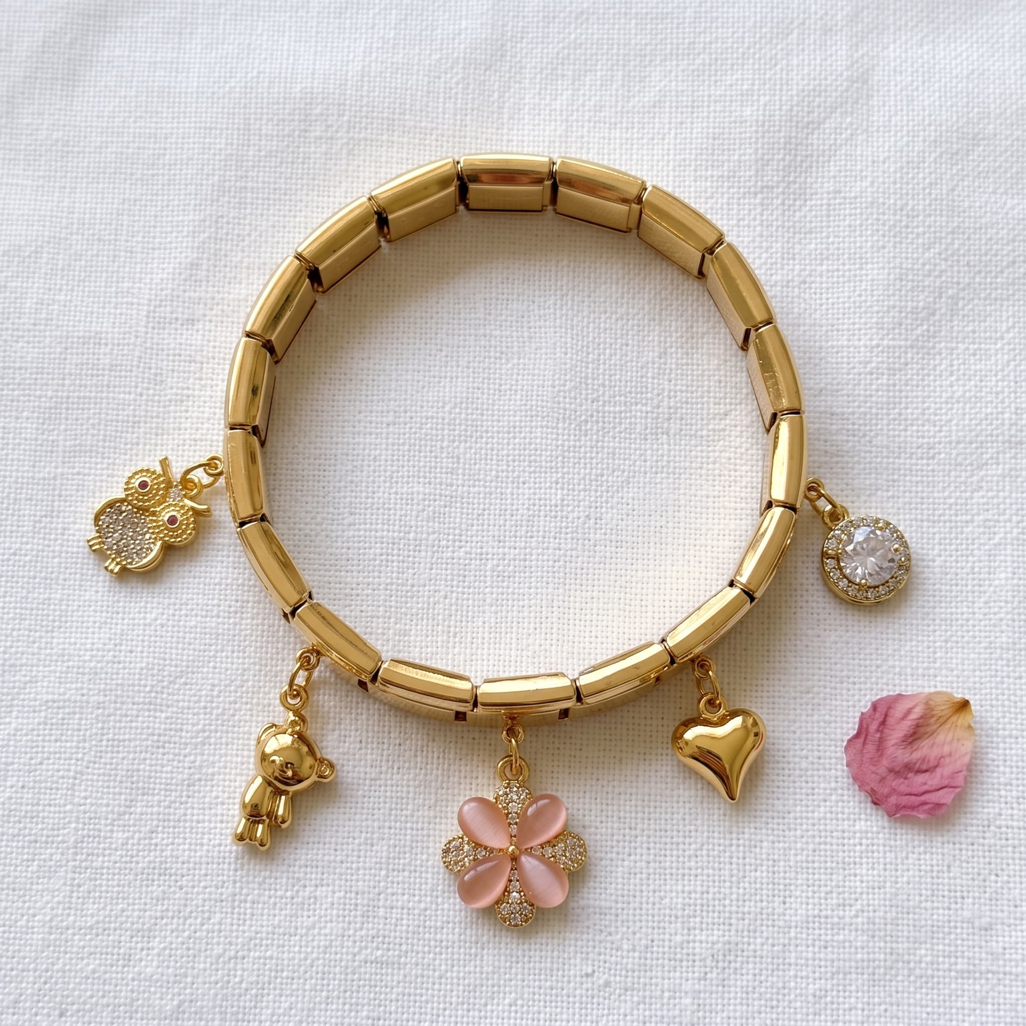 playful gold floral charm bracelet