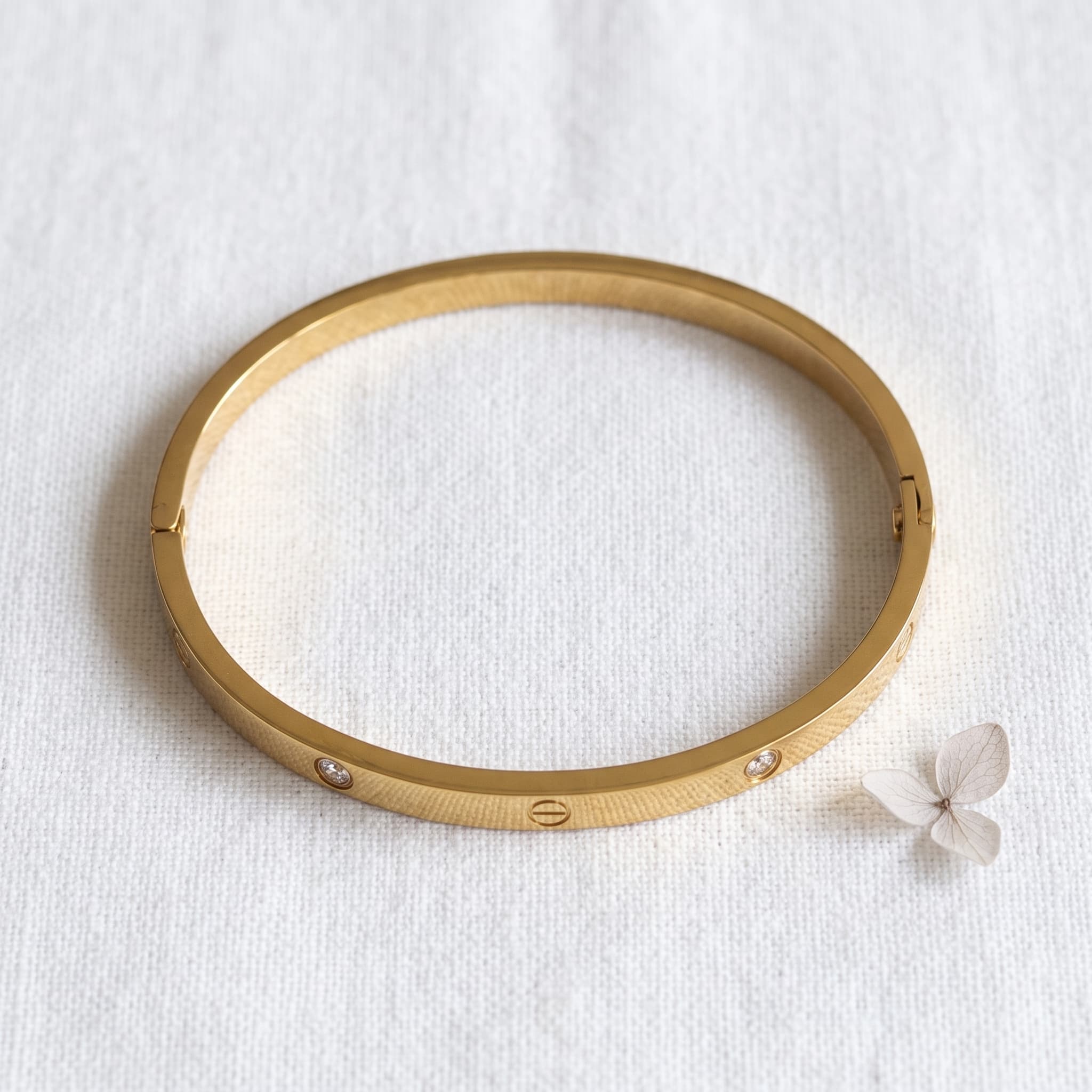 sleek minimalist gold bangle