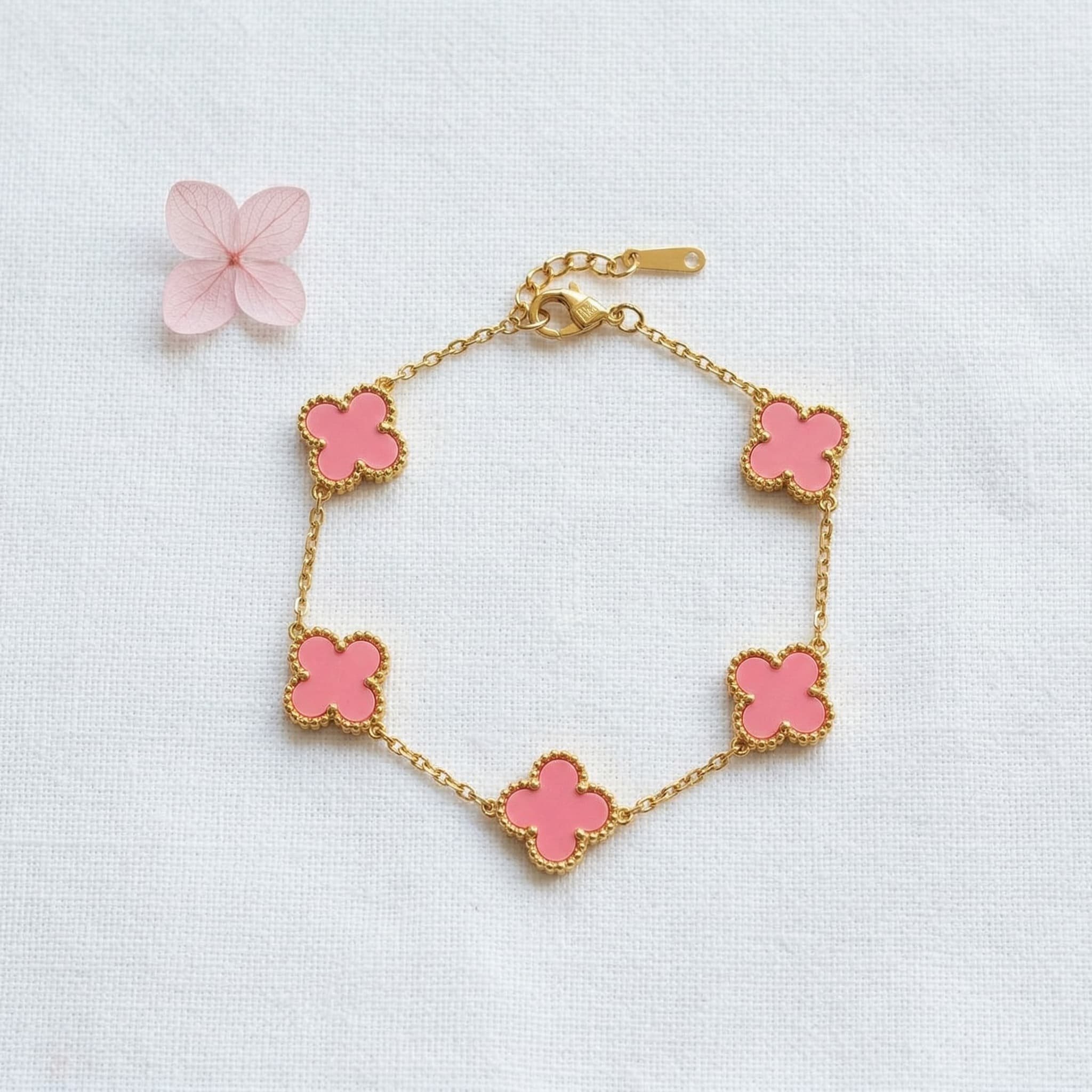 pink clover charm gold bracelet