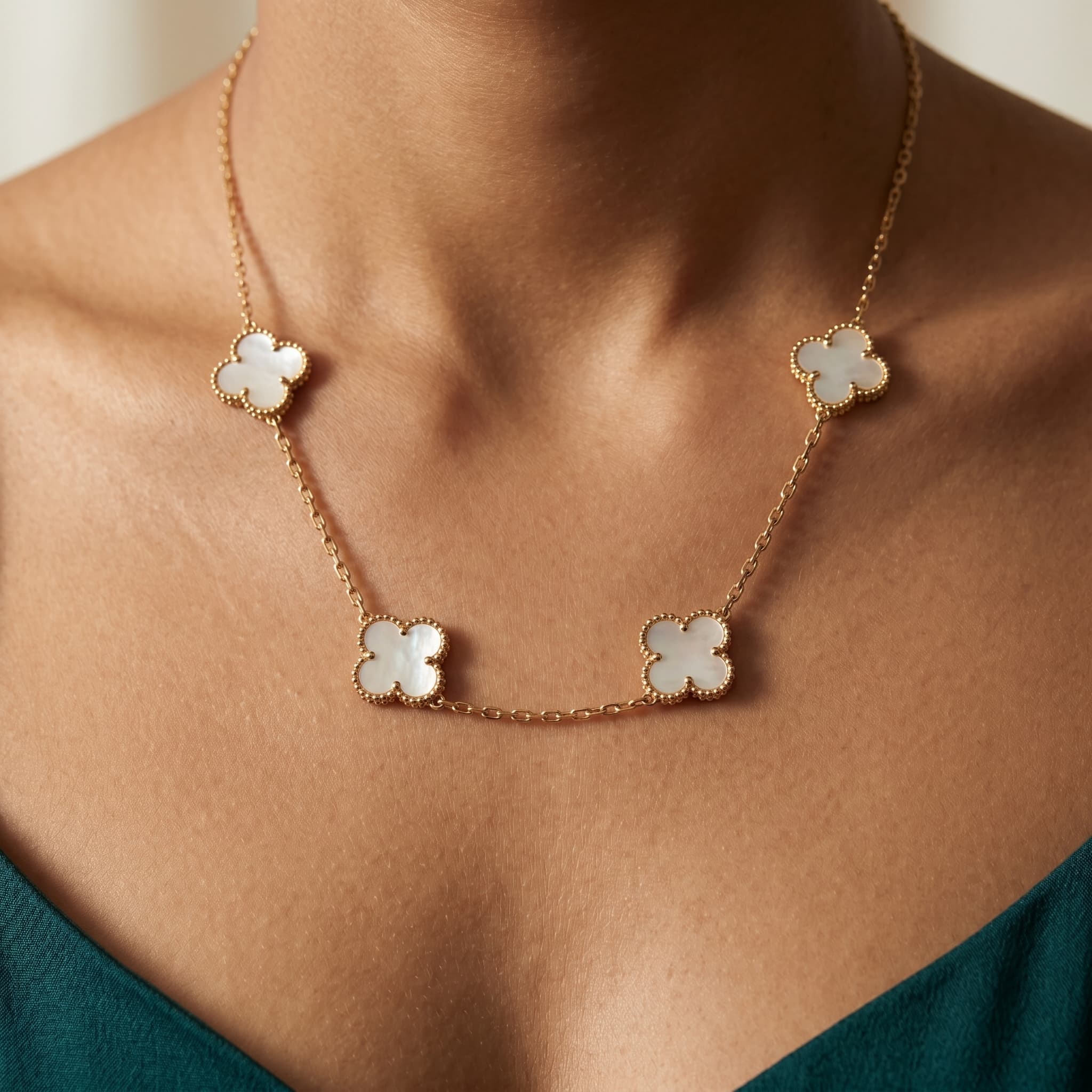 clover motif gold chain