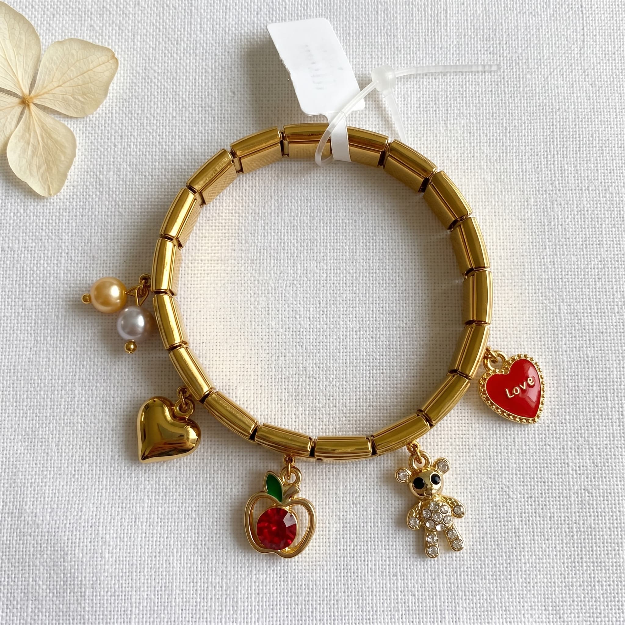 playful gold charm italian bracelet