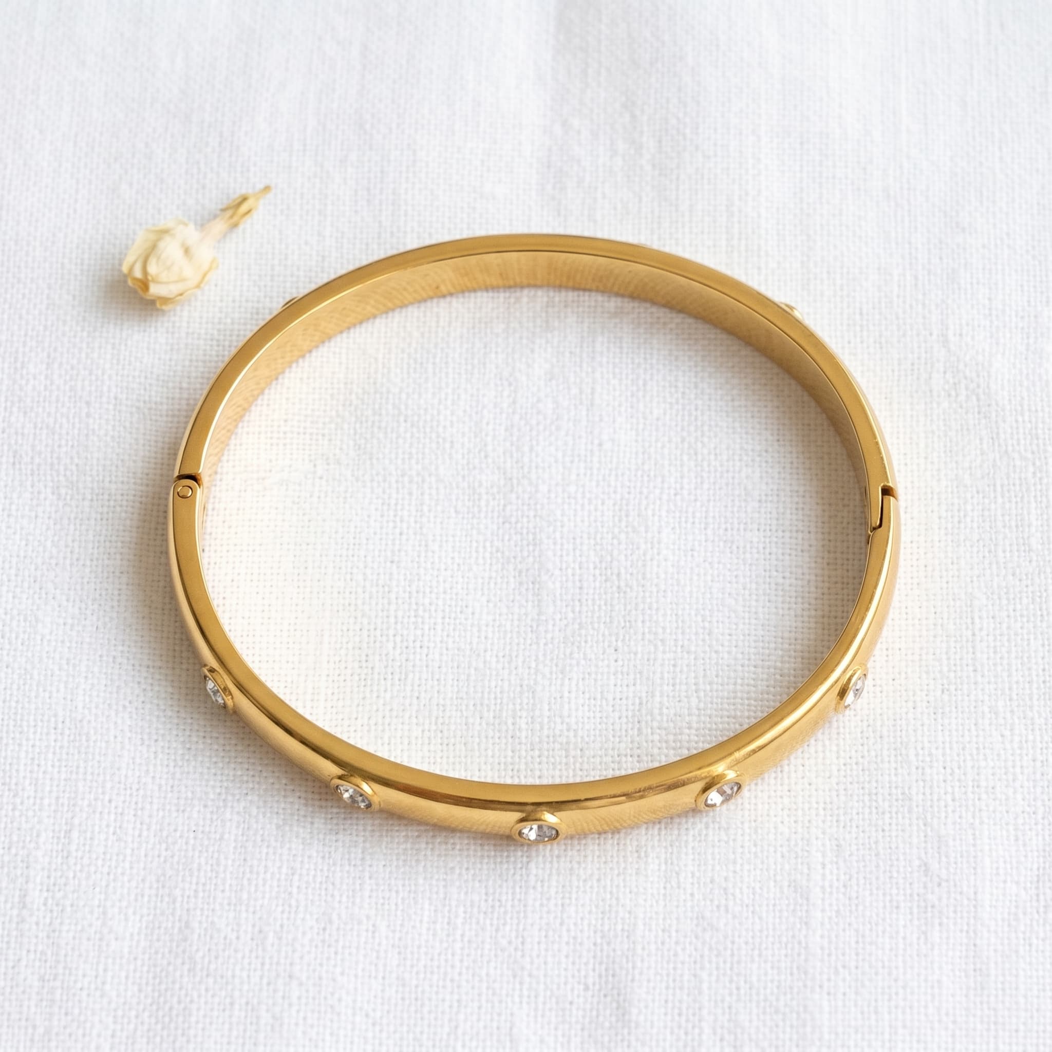 classic stone studded gold bangle