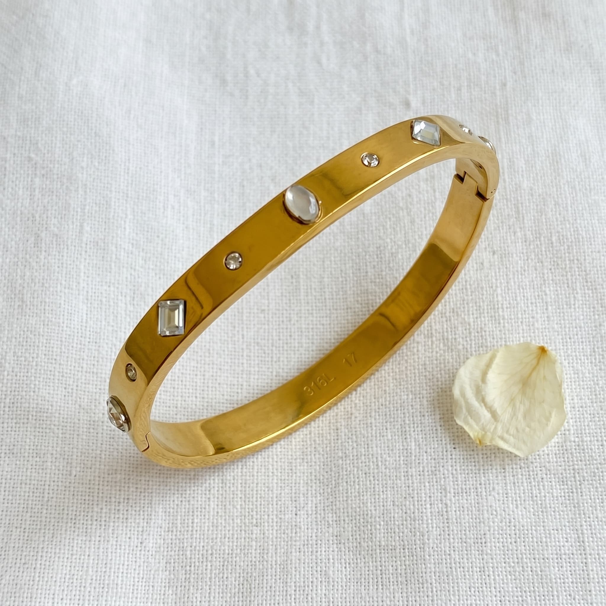 stone studded gold bangle