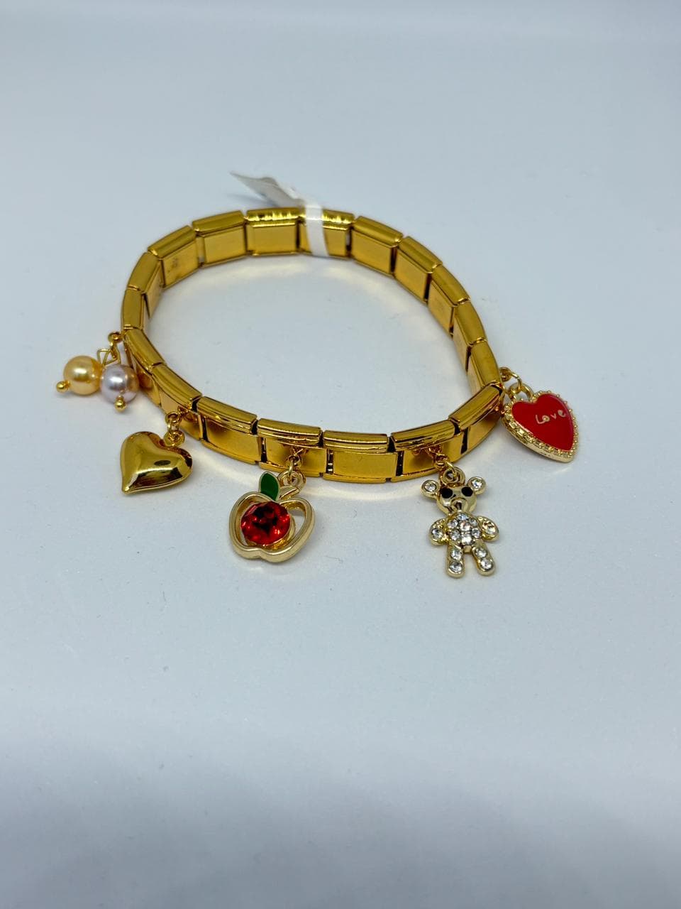 playful gold charm bracelet