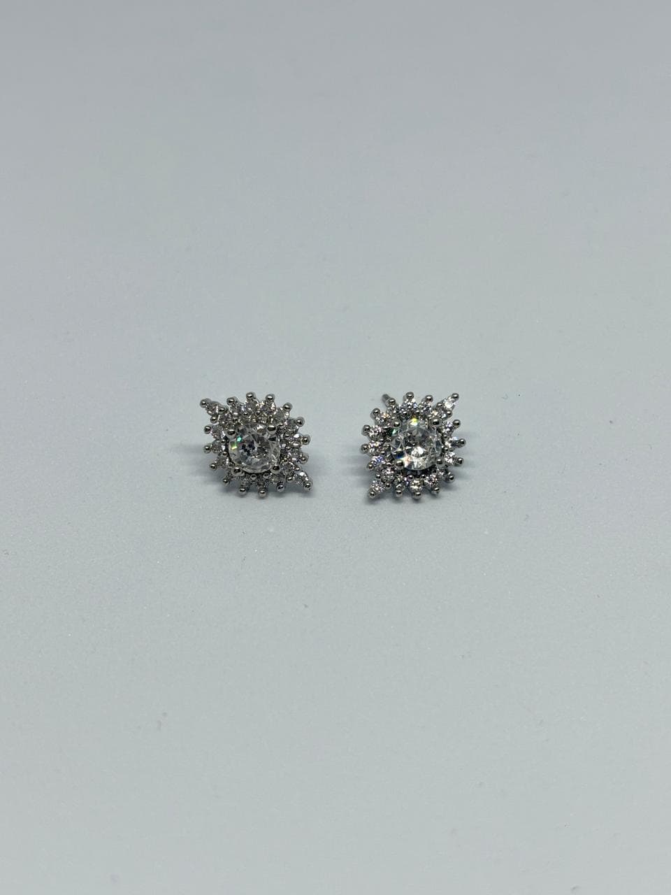 dazzling starburst silver studs