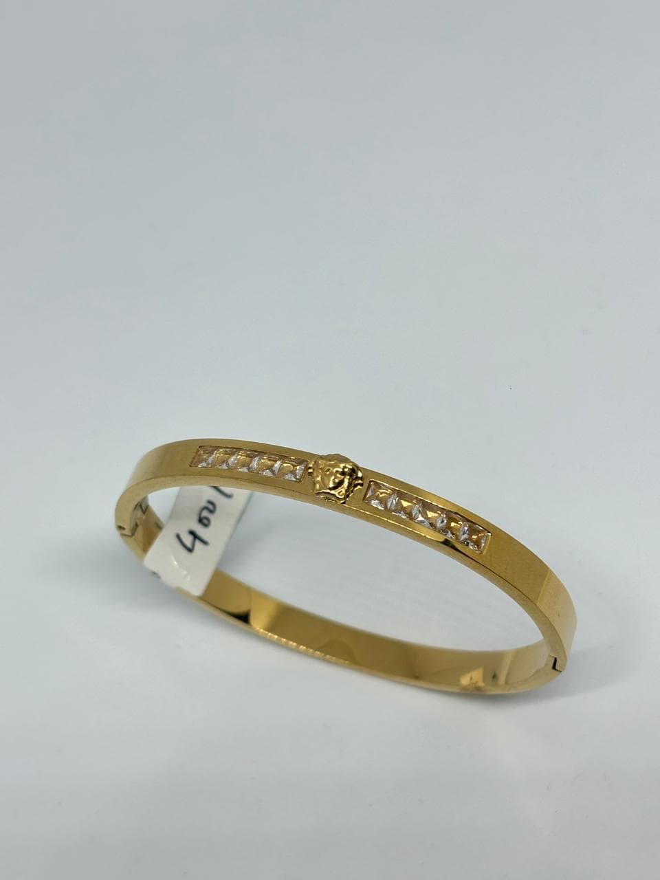 stone studded gold cuff