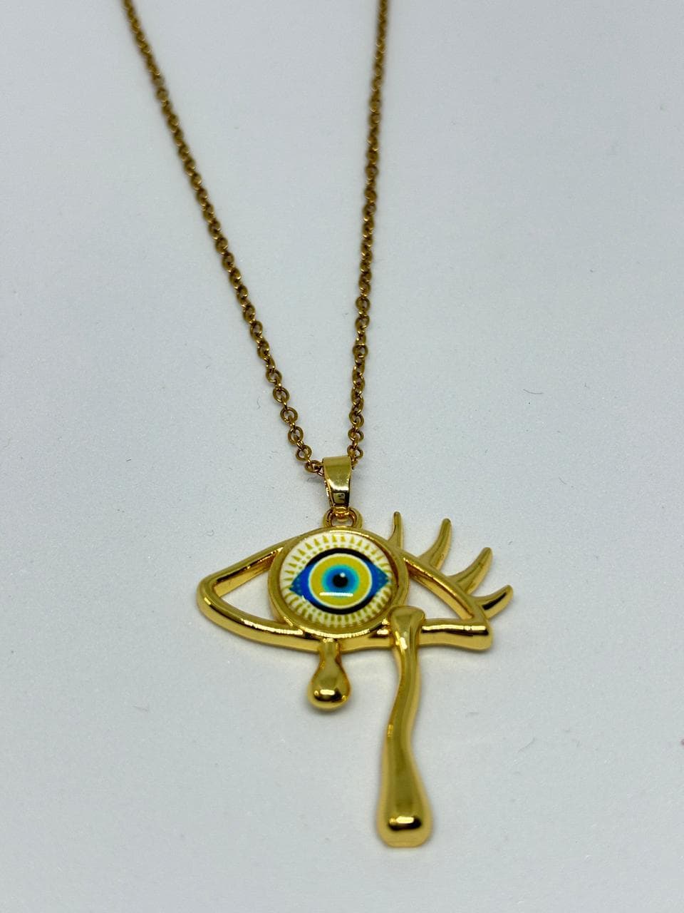 drip evil eye pendant