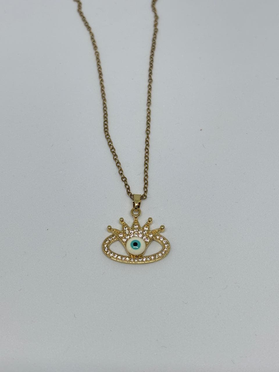 crowned evil eye pendant necklace