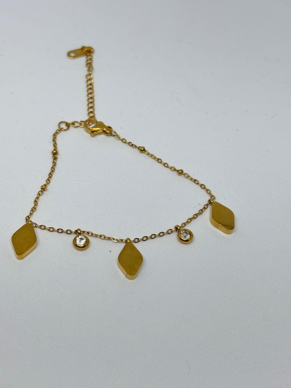 diamond charm gold bracelet