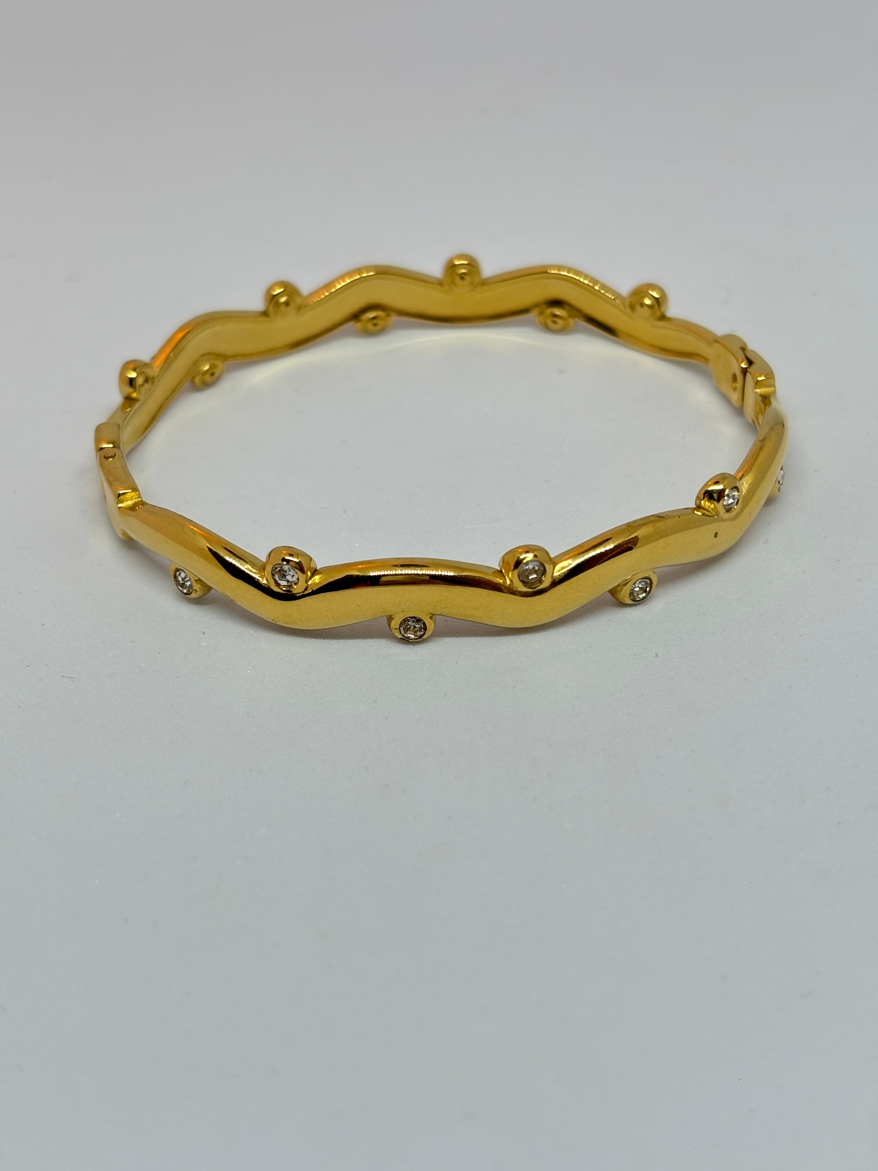 wavy gold stone bangle