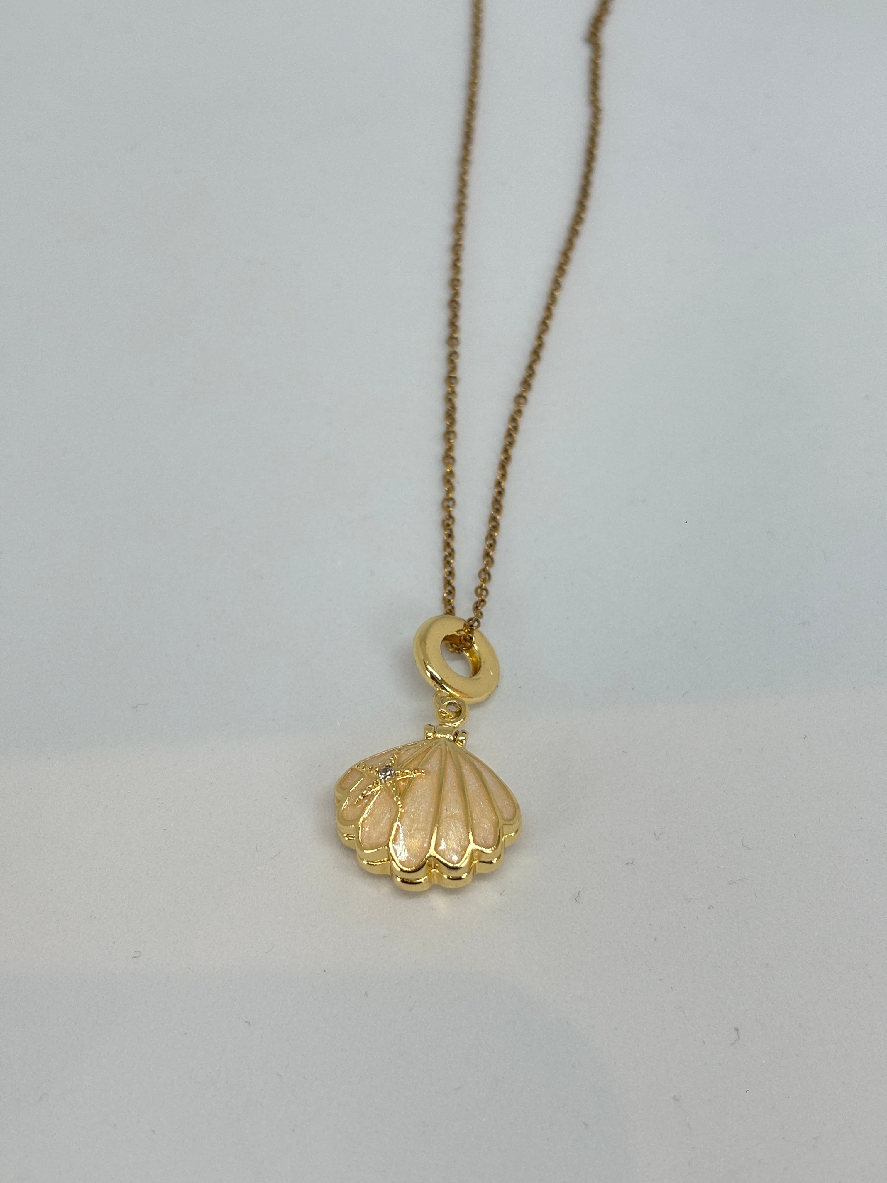 golden seashell pendant